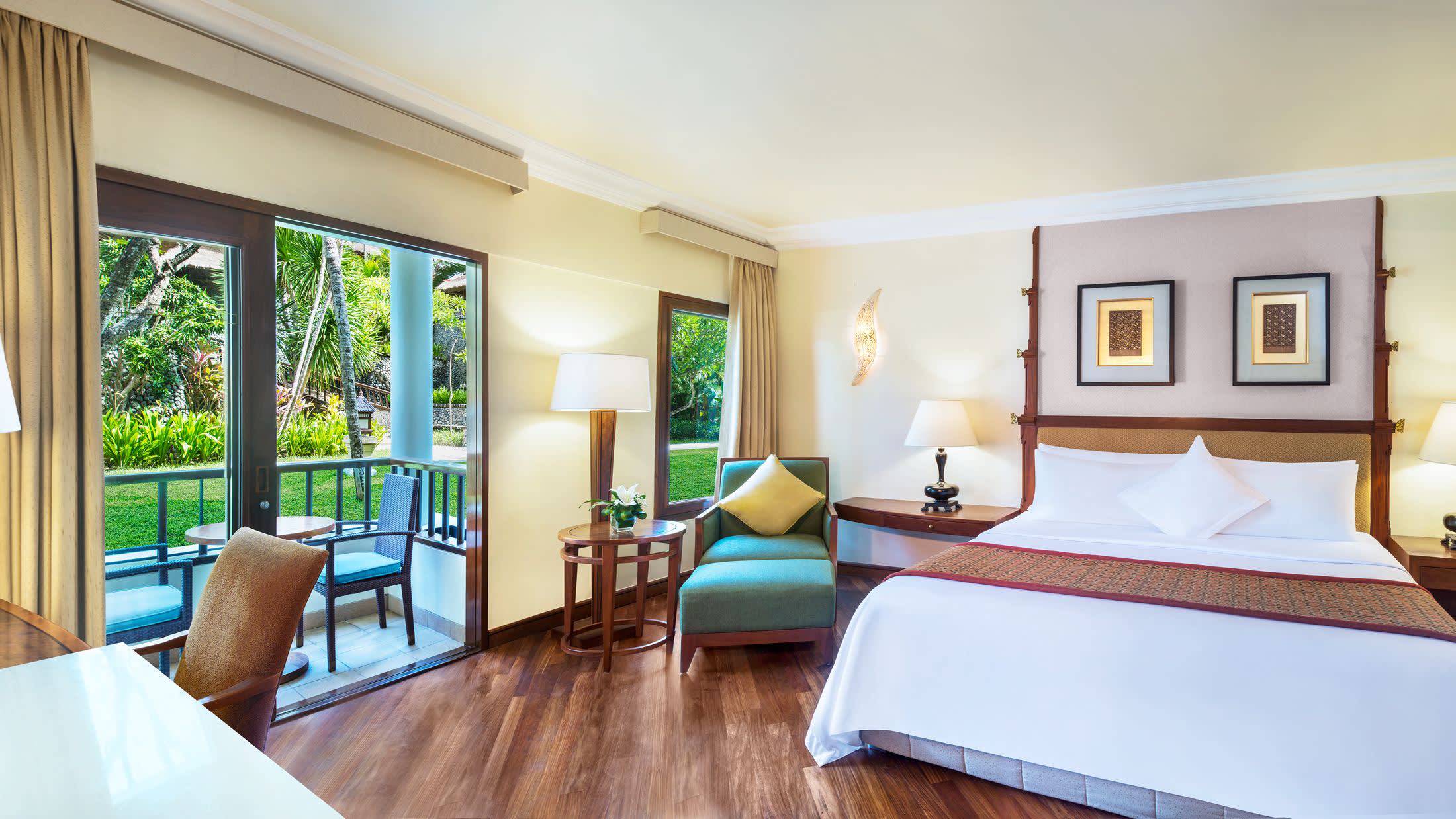 a living room filled with furniture and a flat screen tv