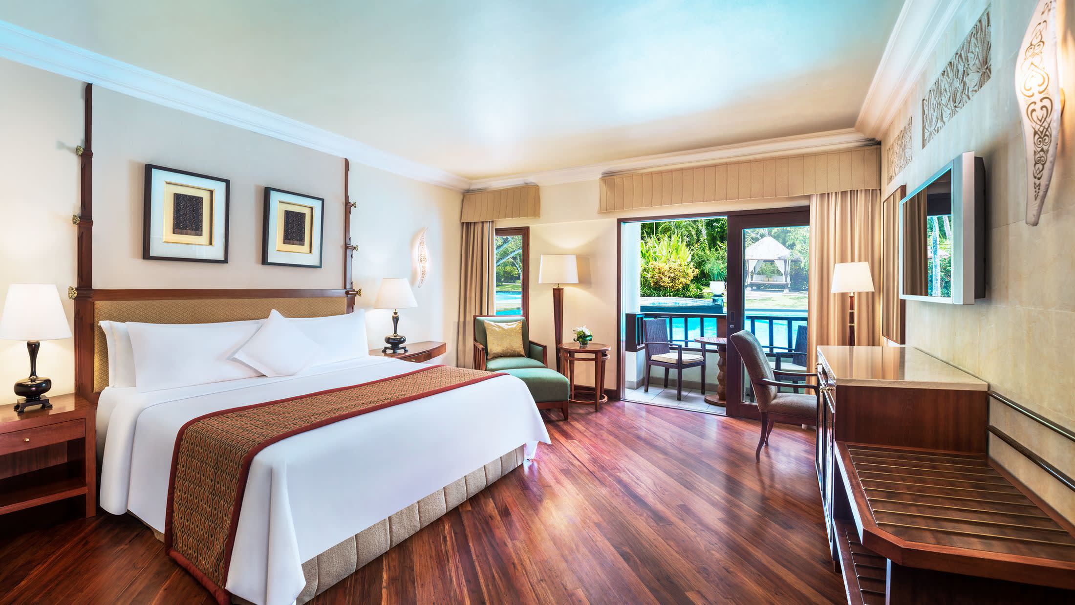 a living room filled with furniture and a large window