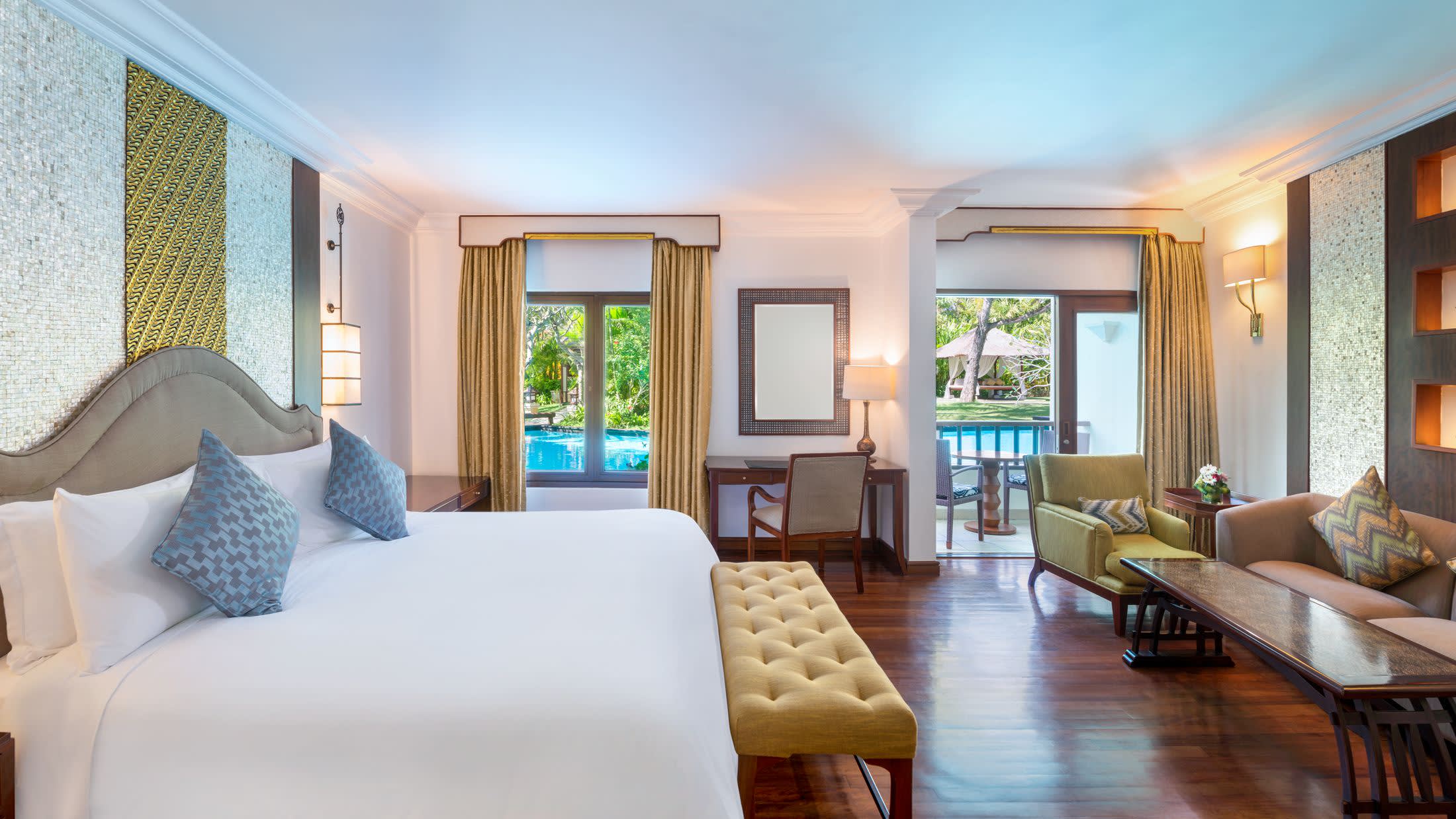 a living room filled with furniture and a large window