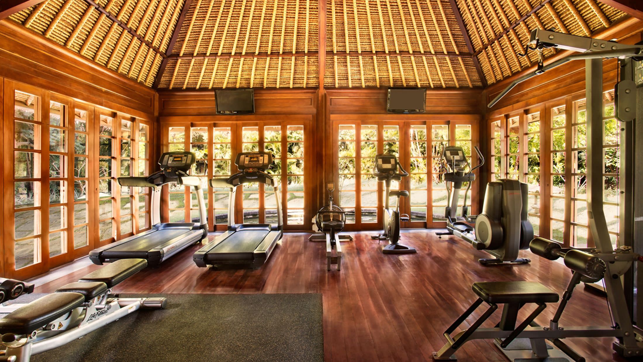 a living room filled with furniture and a large window