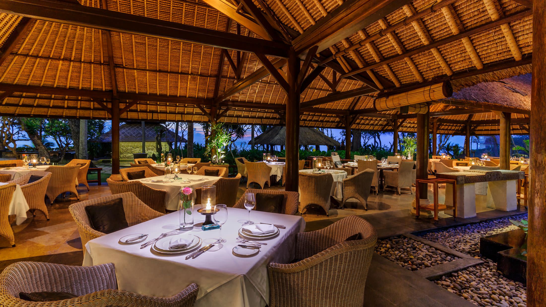 a dining room table in front of a building