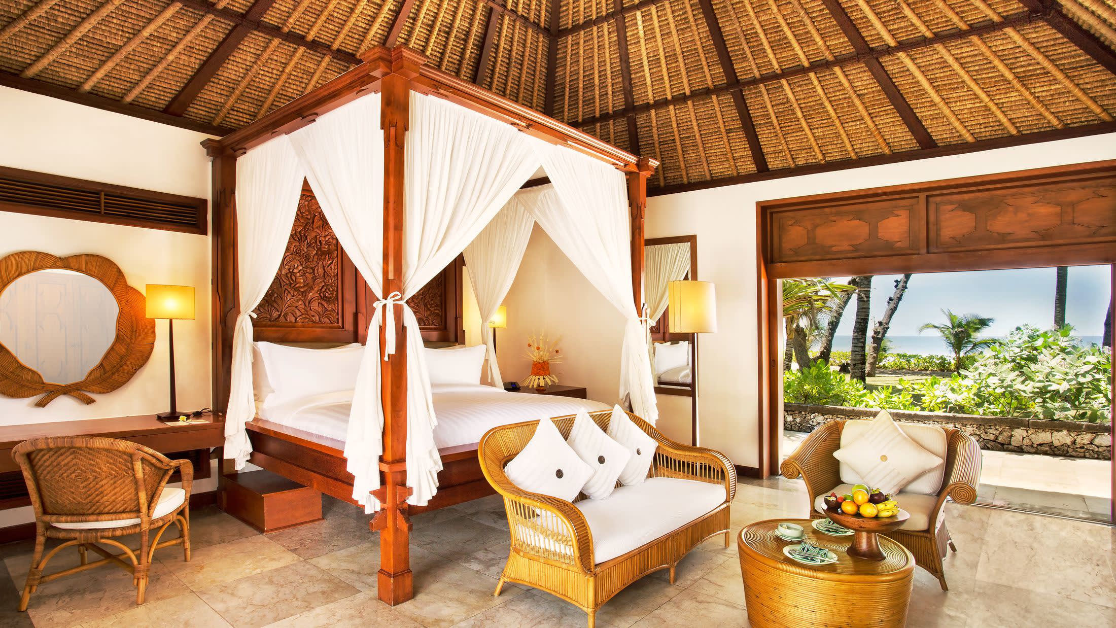 a living room filled with furniture and a fireplace