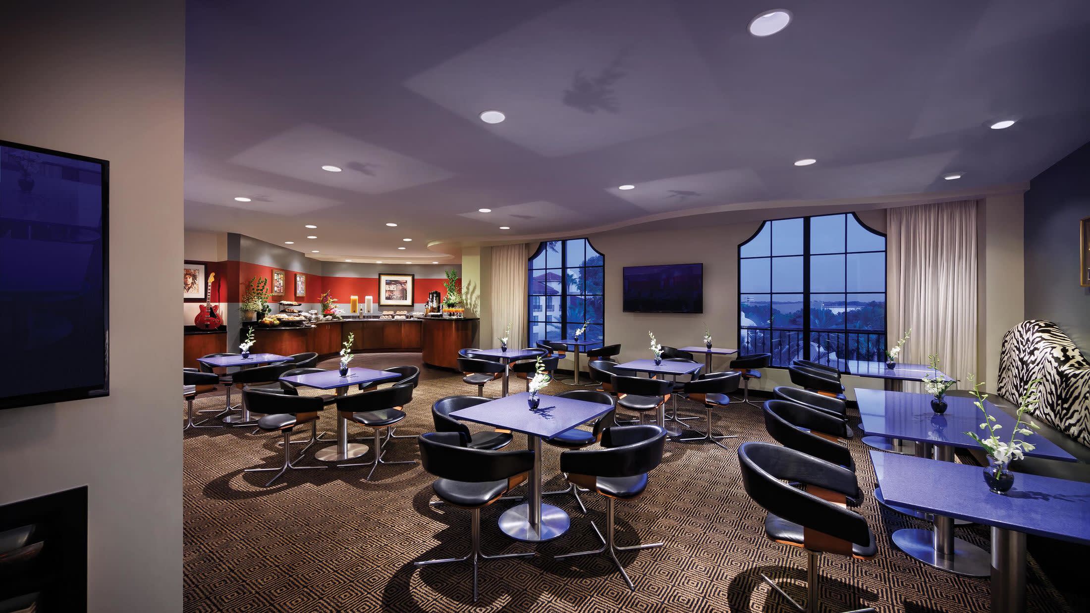 a room filled with furniture and a flat screen tv