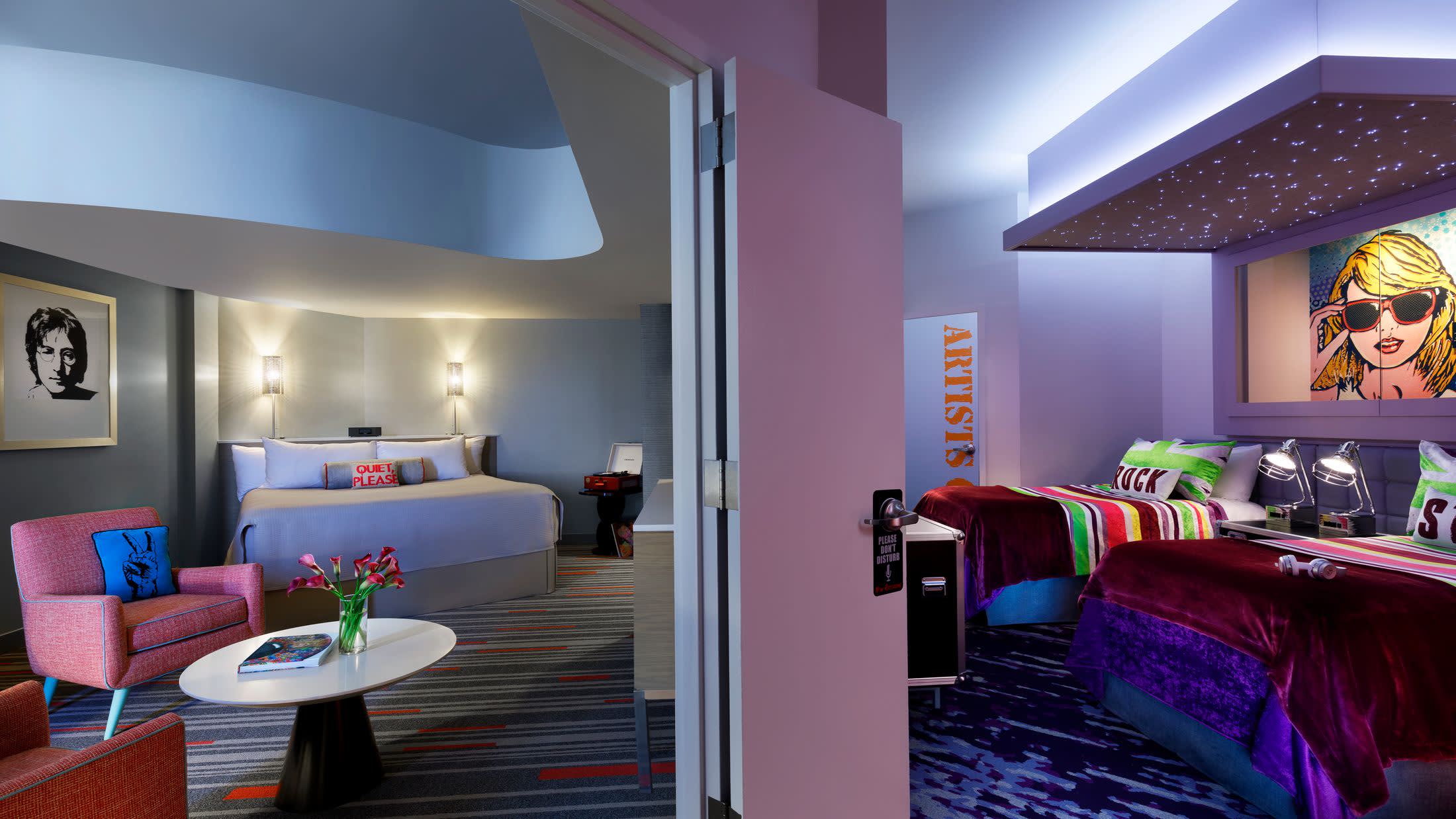 a living room filled with furniture and a flat screen tv