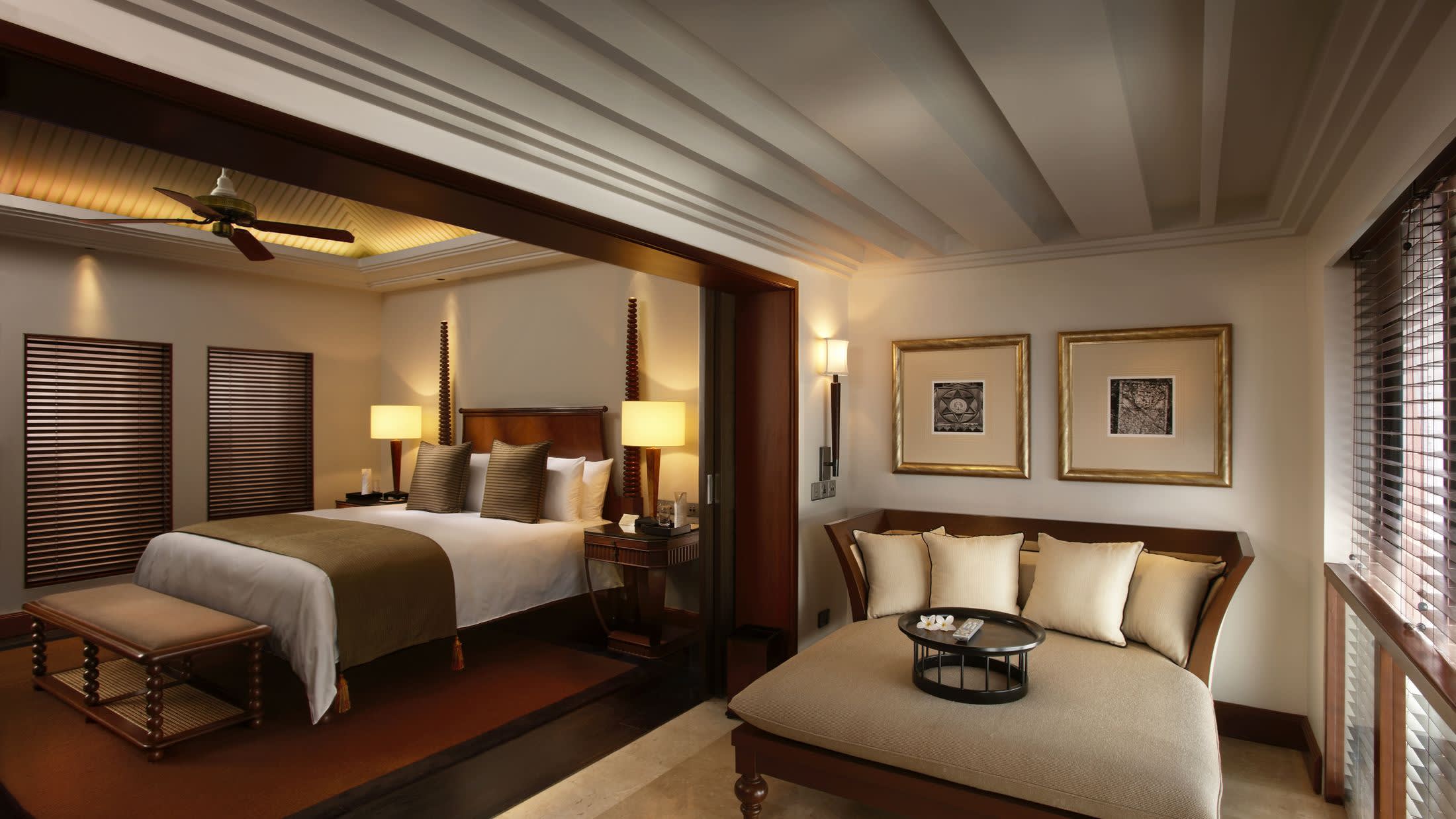 a bedroom with a large bed in a hotel room