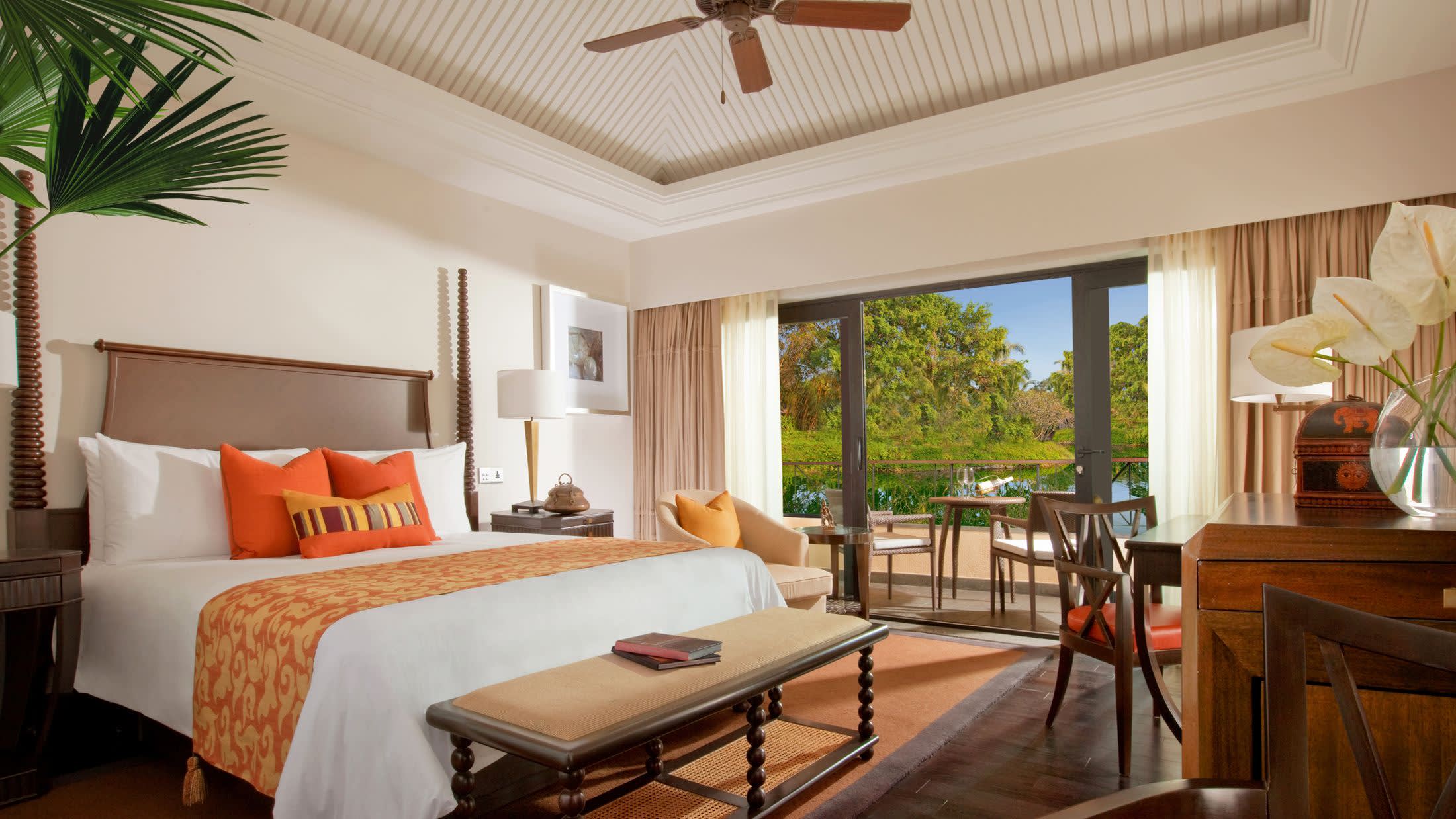a living room filled with furniture and a large window