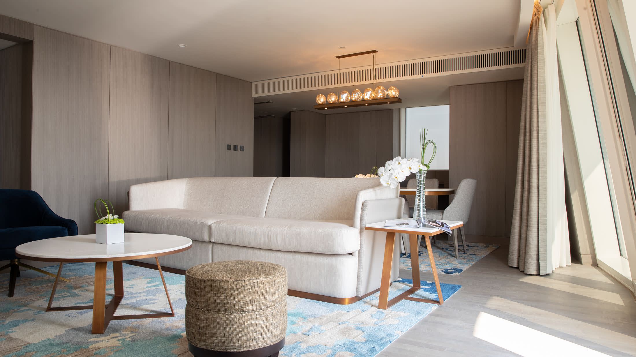 a living room filled with furniture and a fireplace