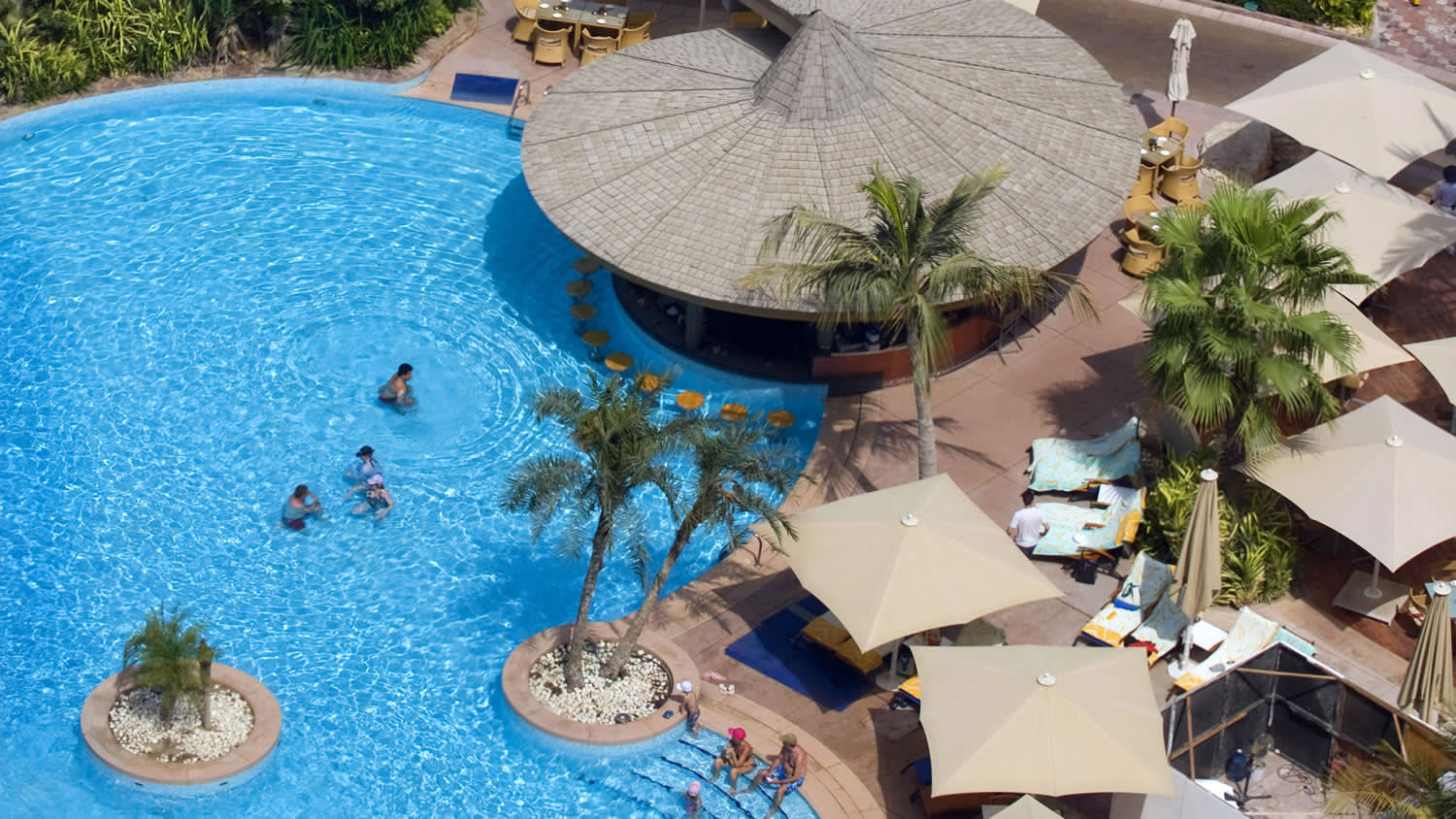 a table topped with a blue umbrella