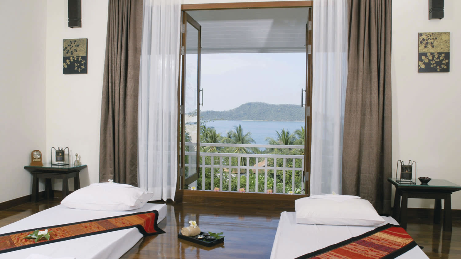 a bedroom with a large window