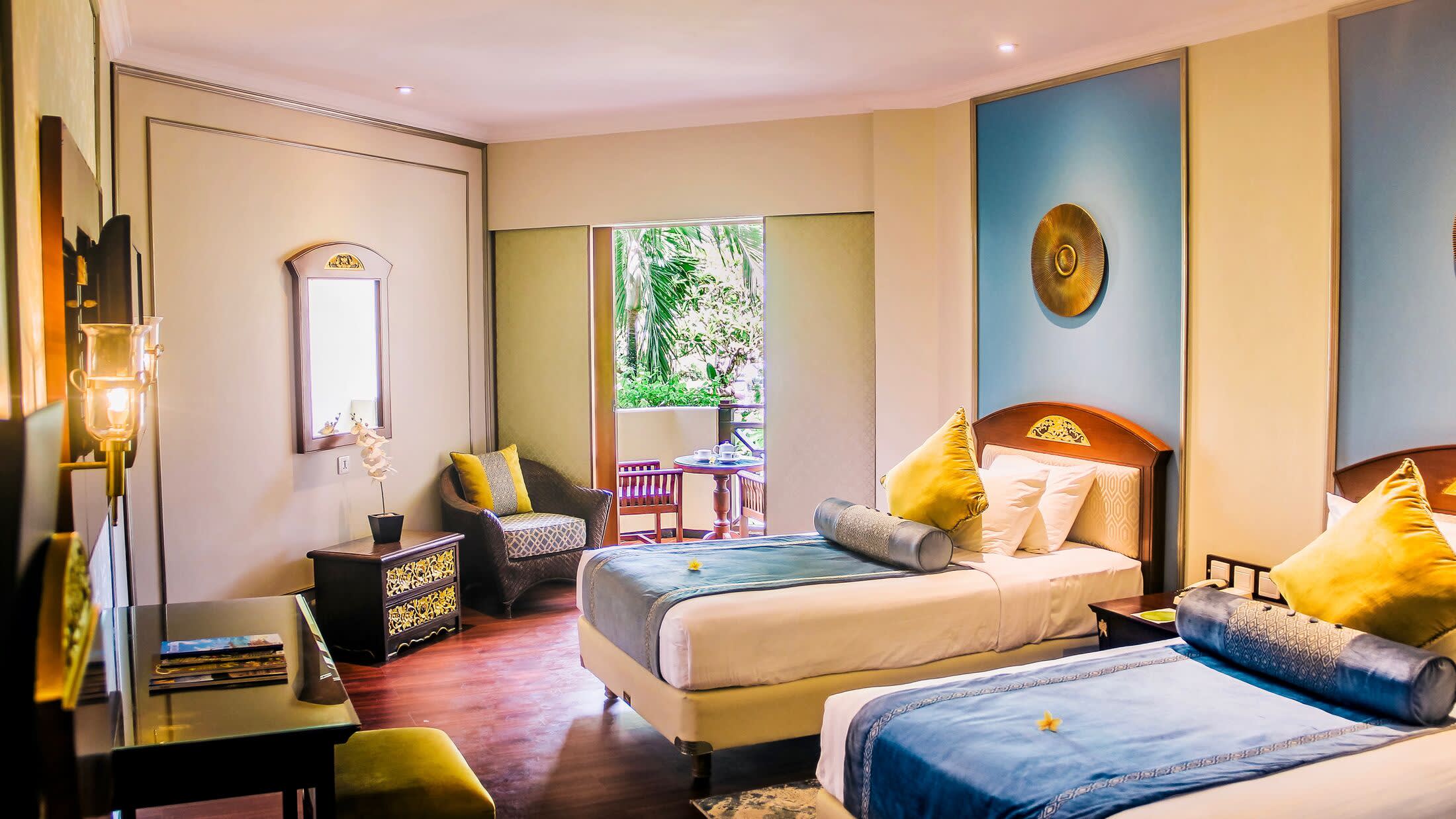 a living room filled with furniture and a flat screen tv