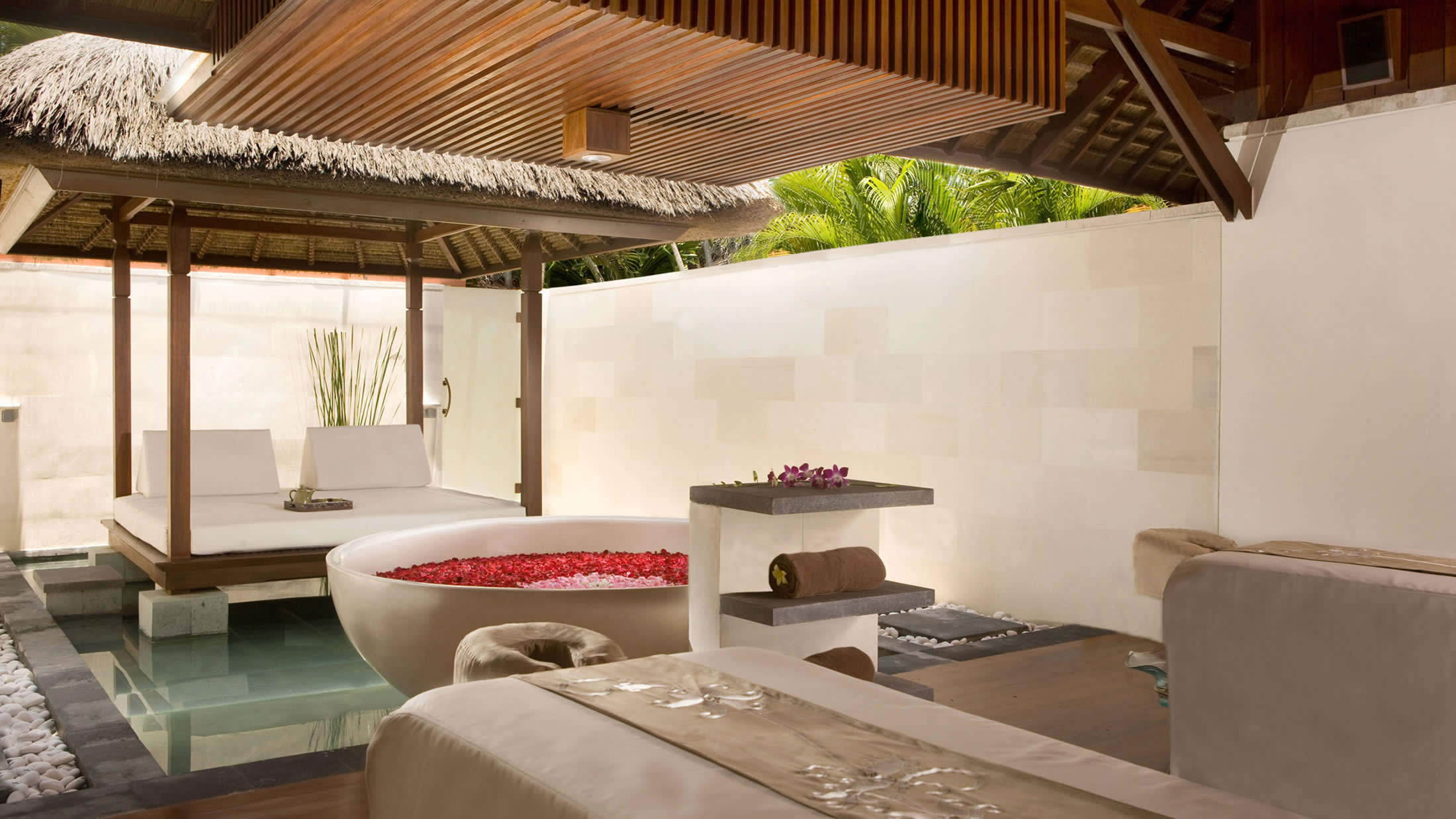 a living room filled with furniture and a table