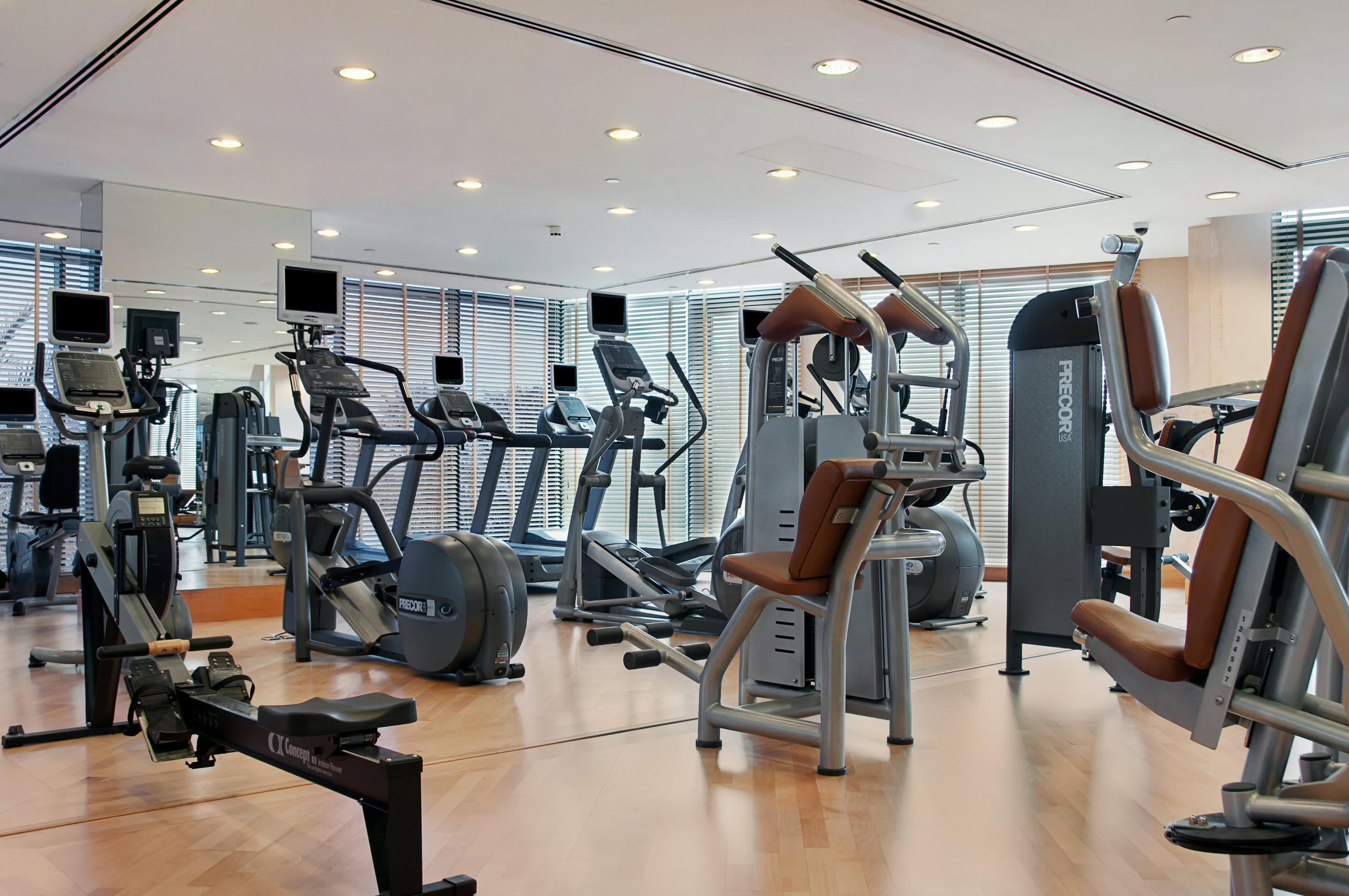 an office with a desk and chair in a room