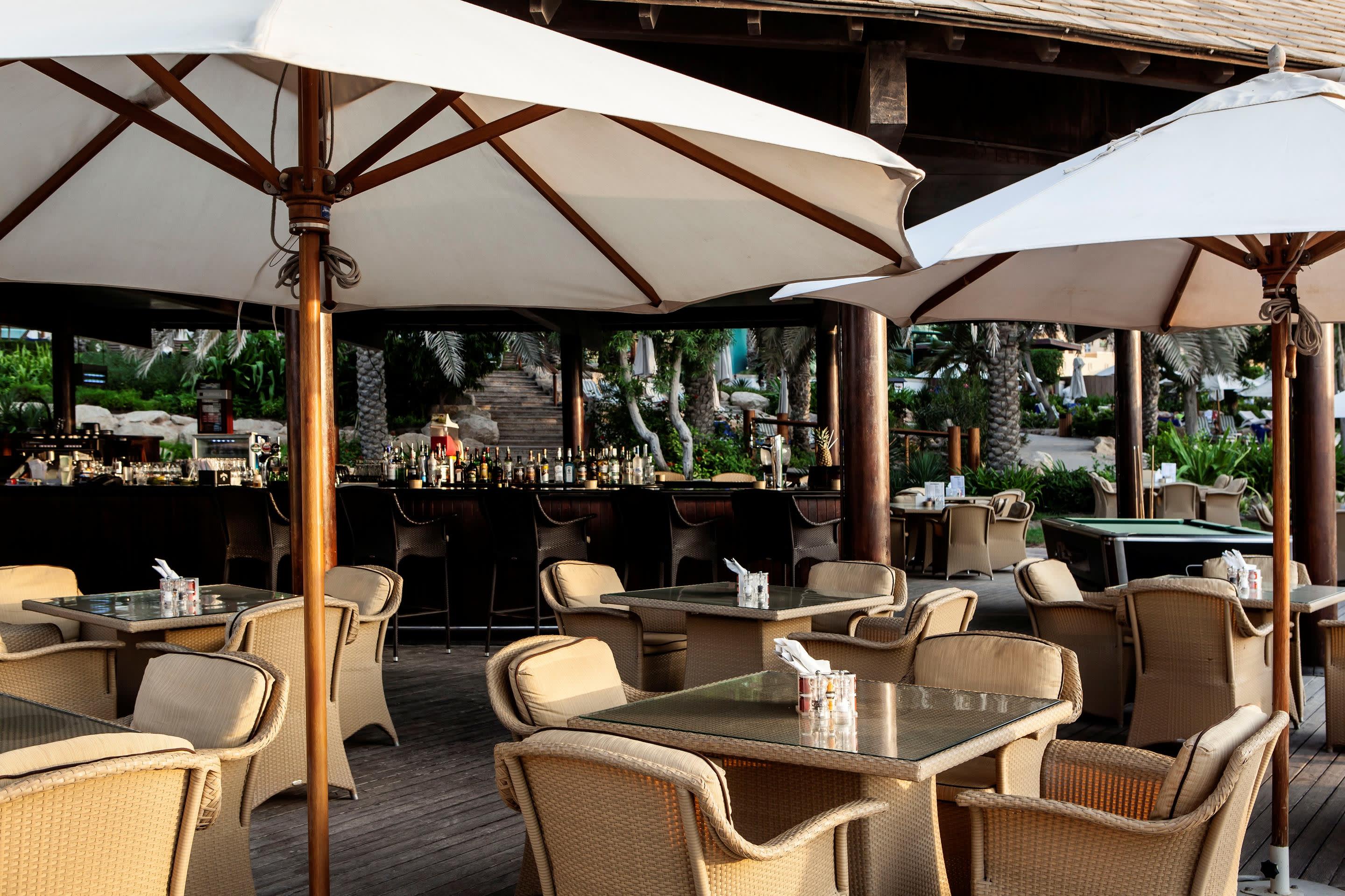 a dining room table in front of a building