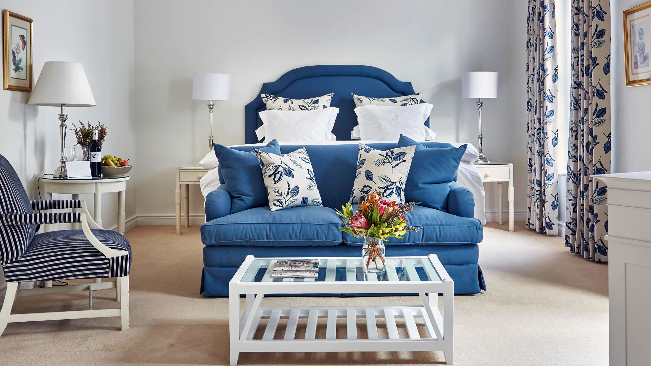 a living room filled with furniture and a fire place