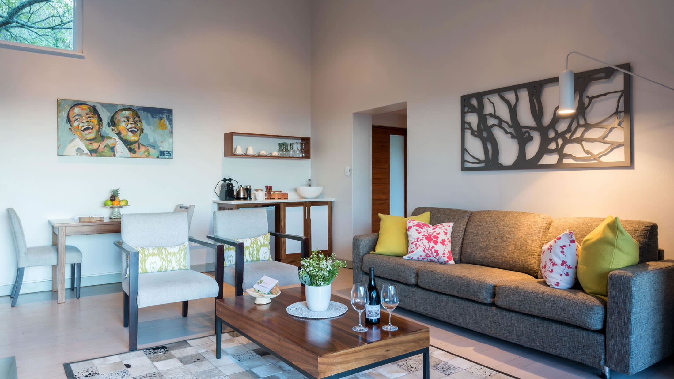 a living room filled with furniture and a fire place