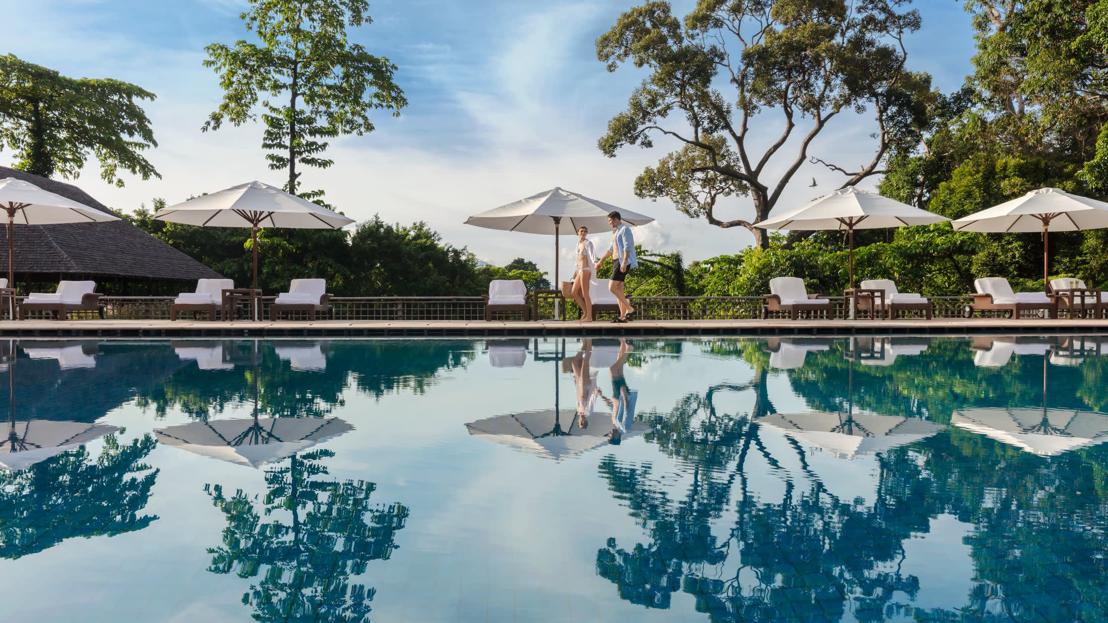 a house with a large pool of water