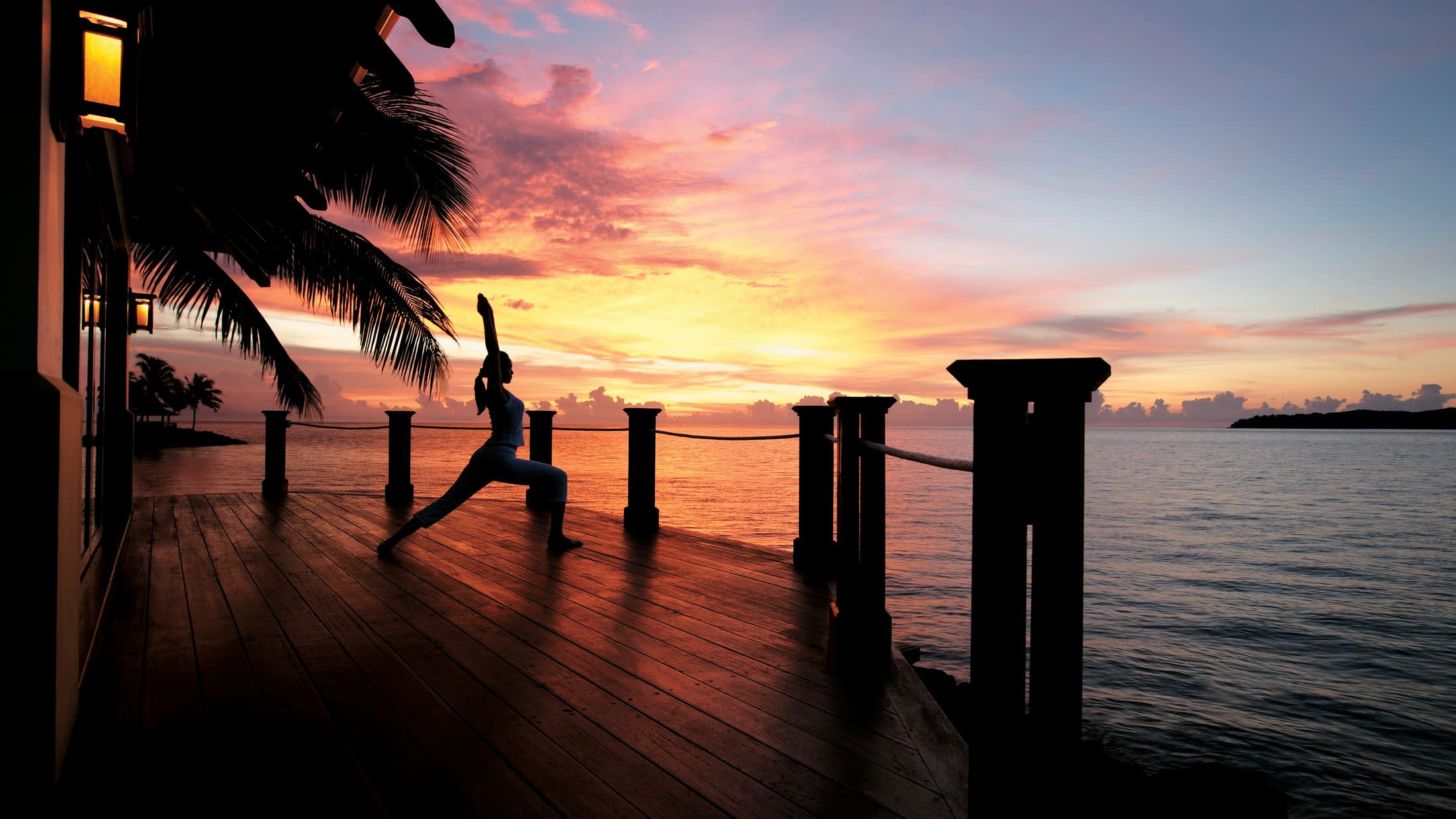 a sunset over a body of water