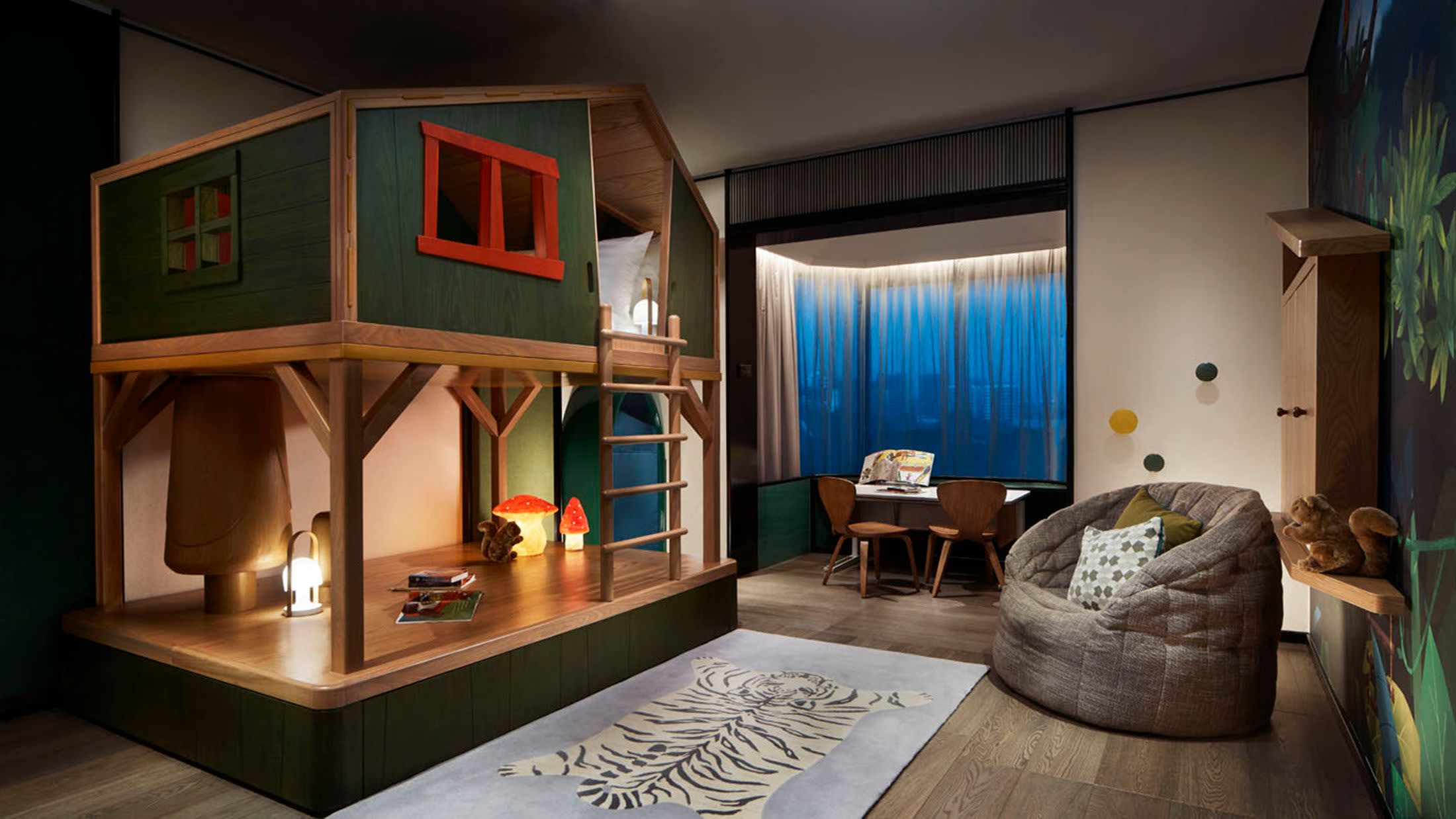 a living room filled with furniture and a large window