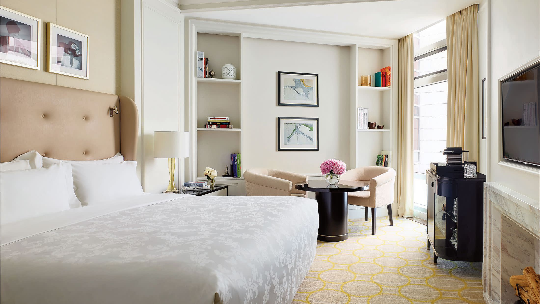 a bedroom with a large bed in a room