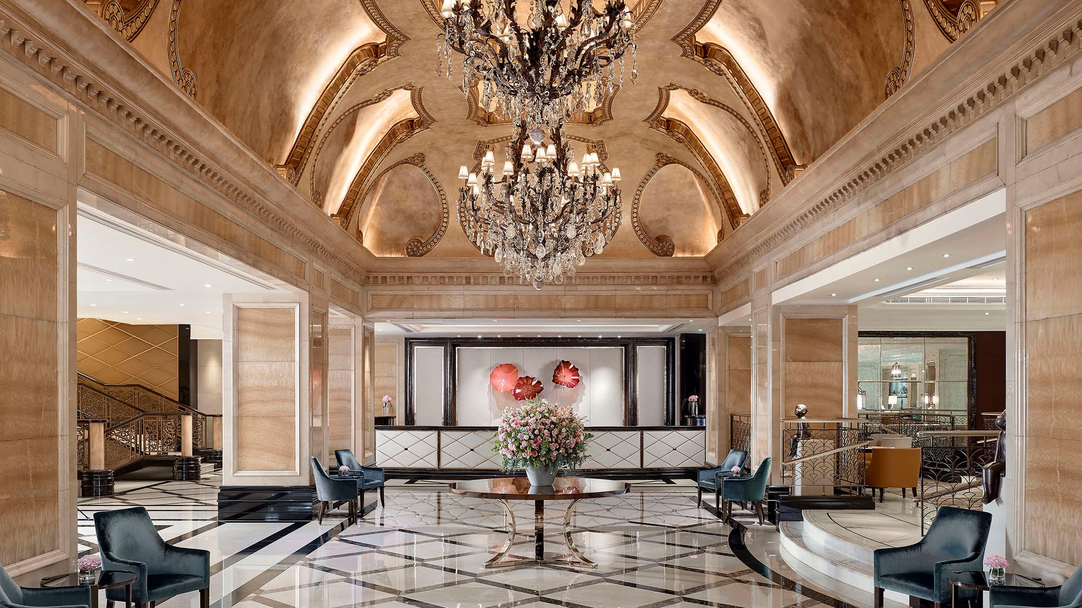 a living room filled with furniture and a large window