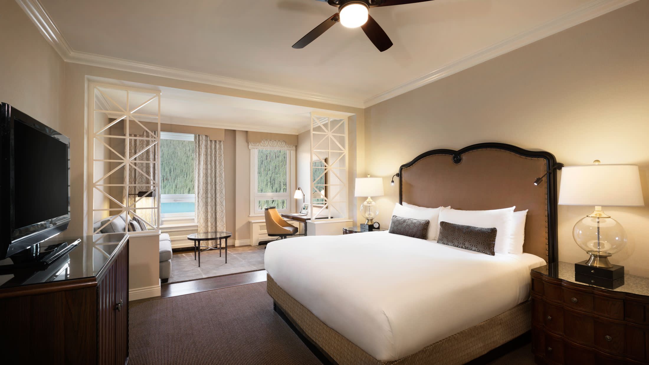 a bedroom with a large bed in a room