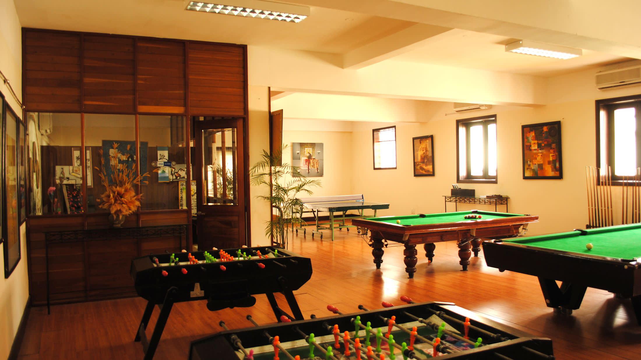 a living room filled with furniture and a table