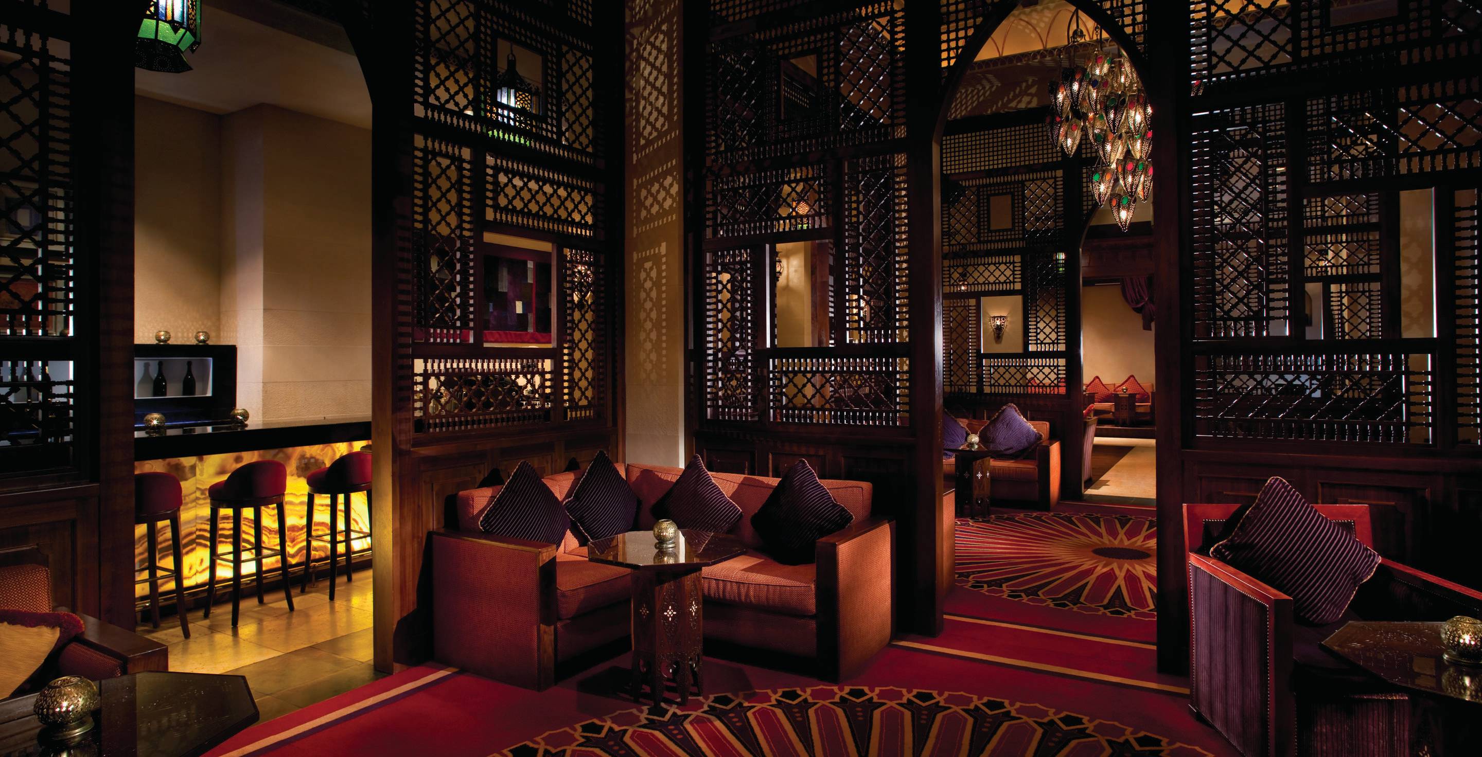 a living room filled with furniture and a large window