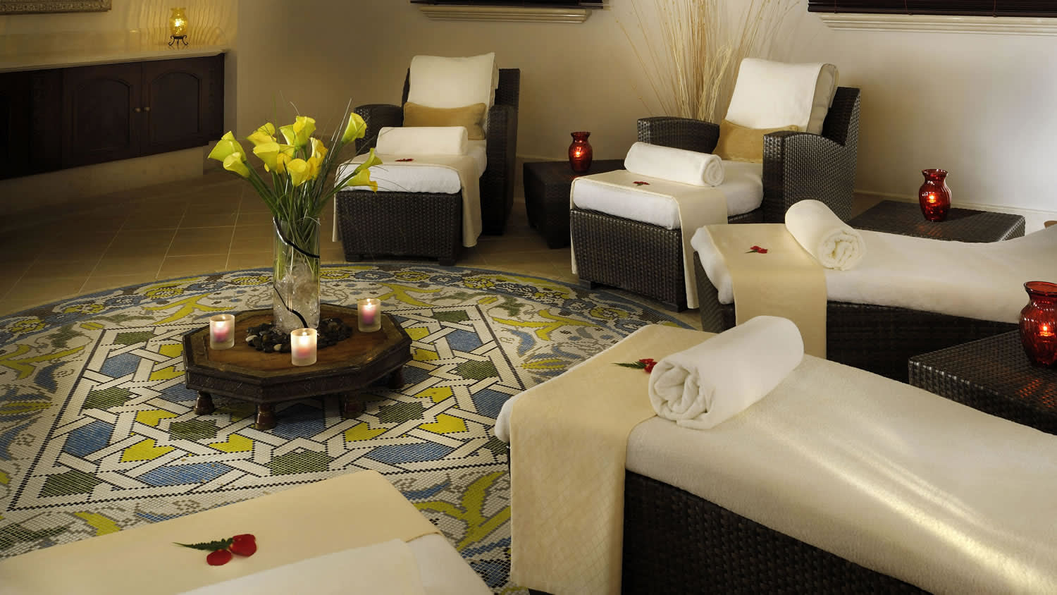 a living room filled with furniture and a fire place