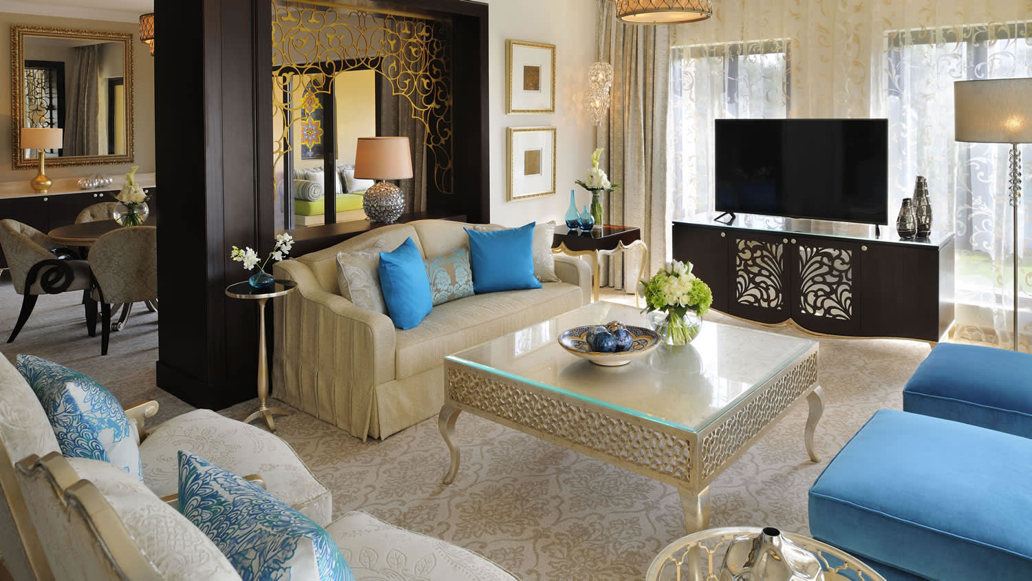 a living room filled with furniture and a fire place