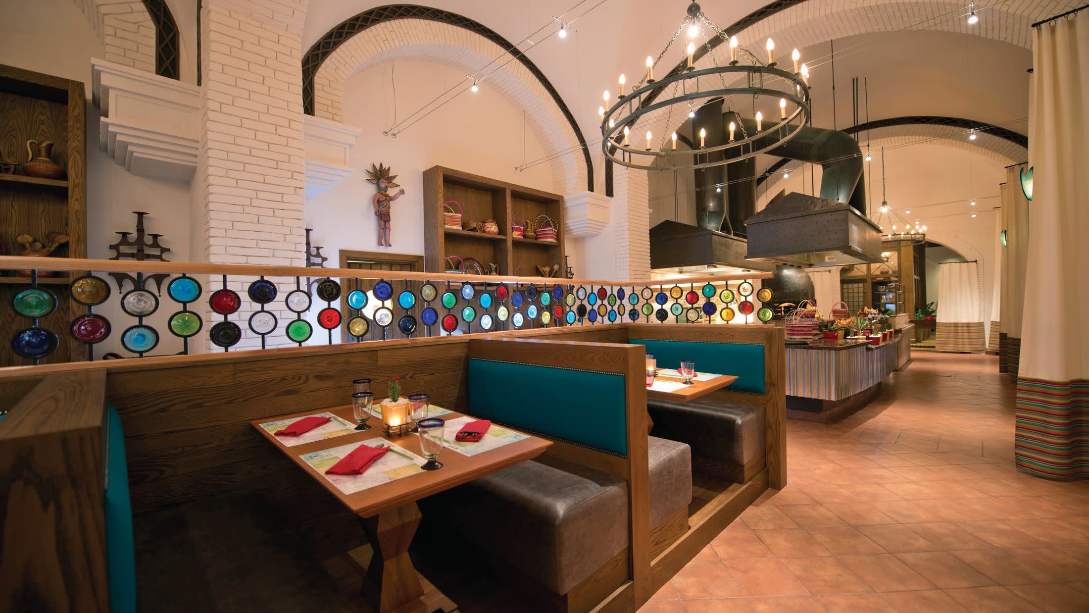 a living room with a couch a table and chairs