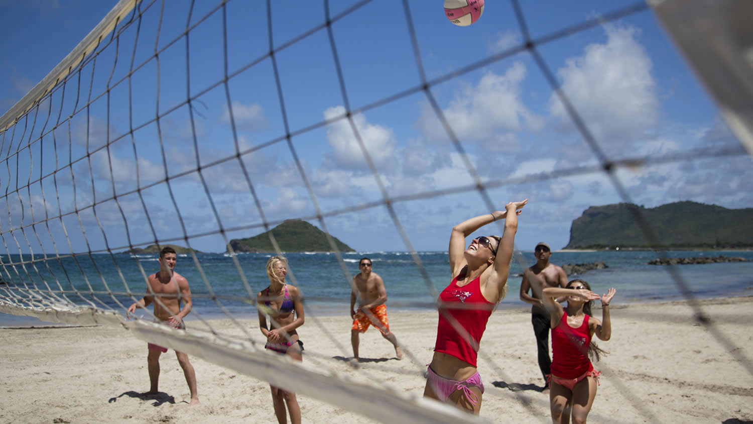 a group of people on a beach