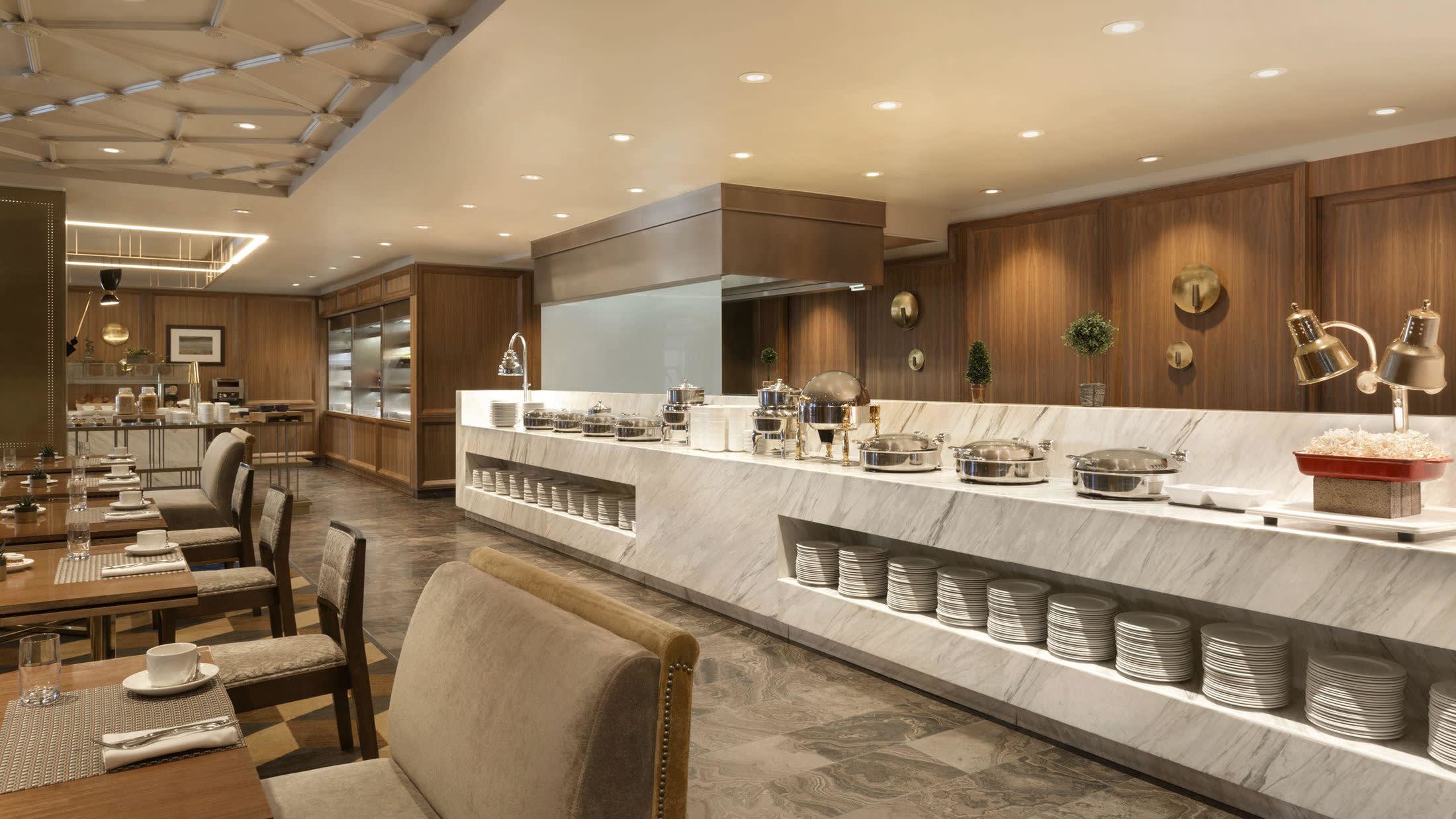 a room filled with furniture and a large window