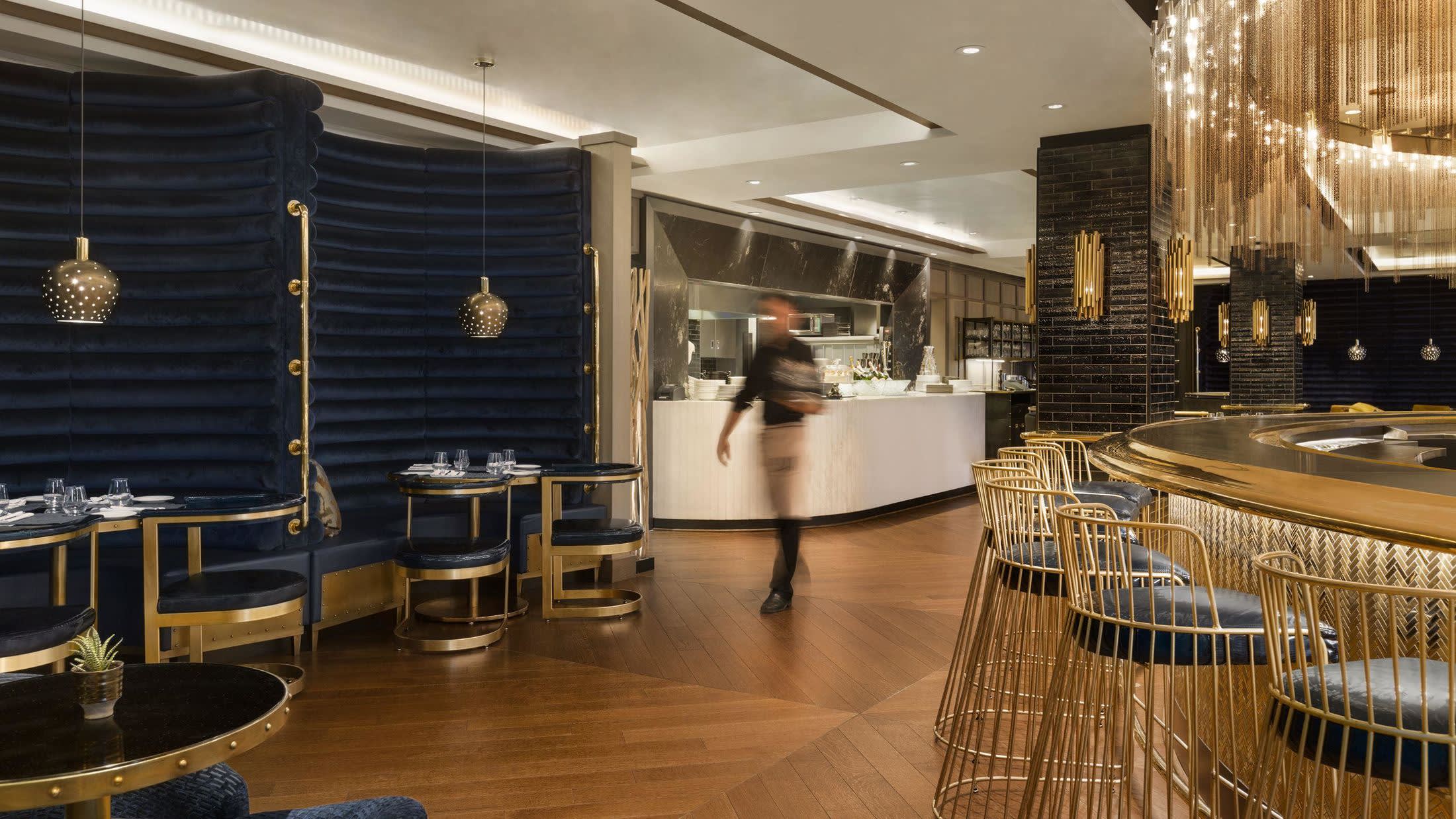 a room filled with furniture and a large window