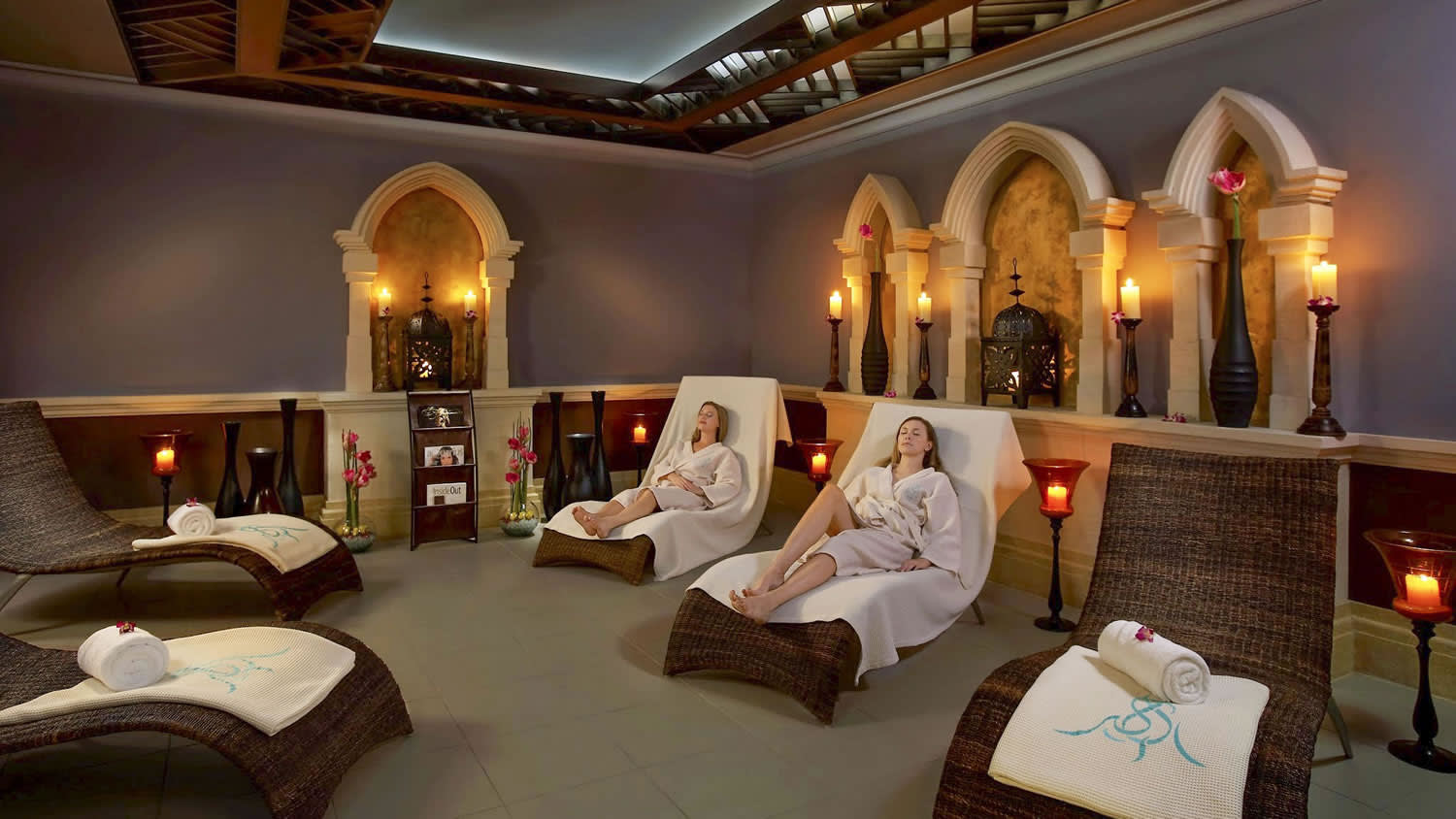 a bedroom with a large mirror