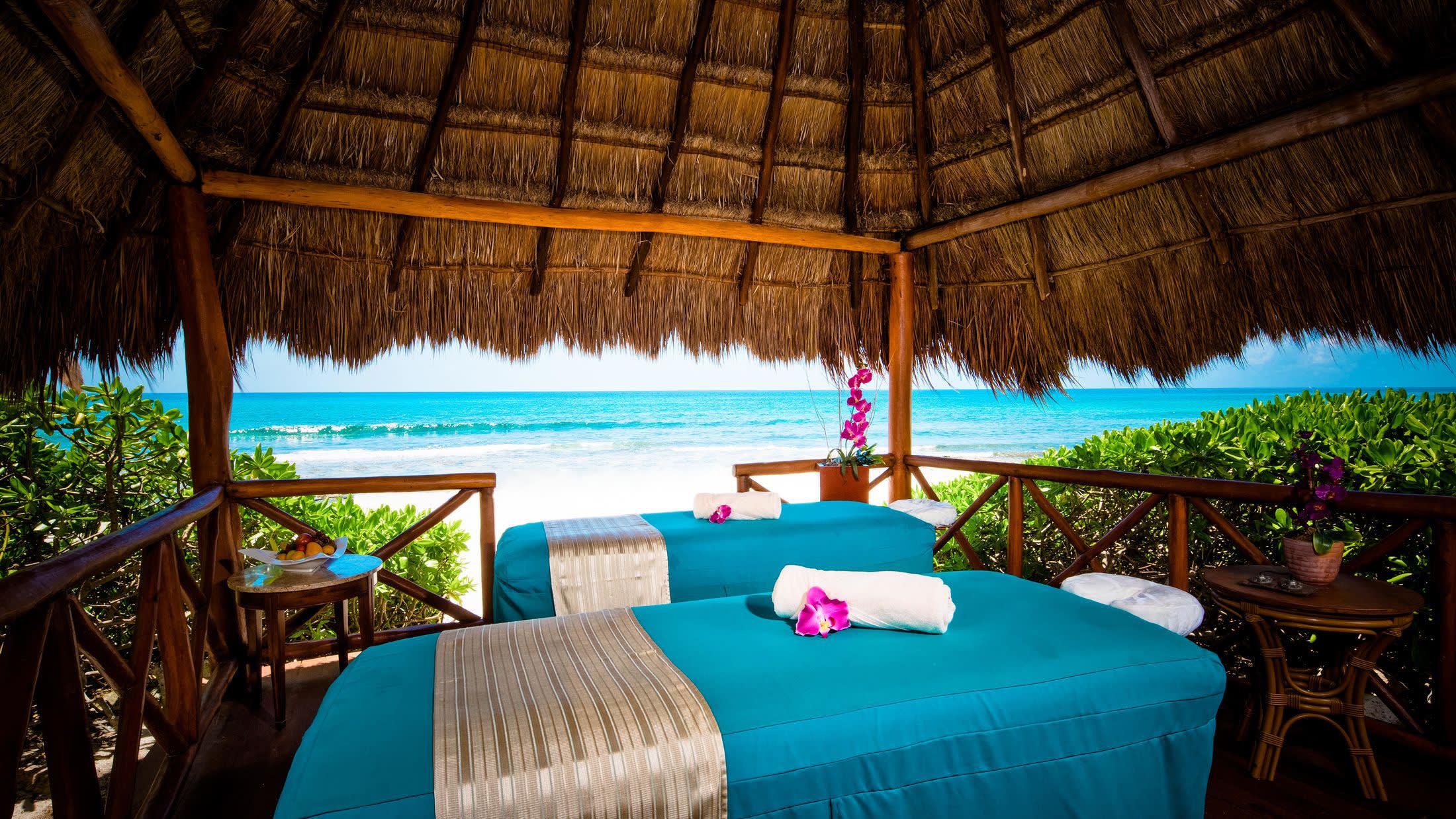 a bed with a blue umbrella