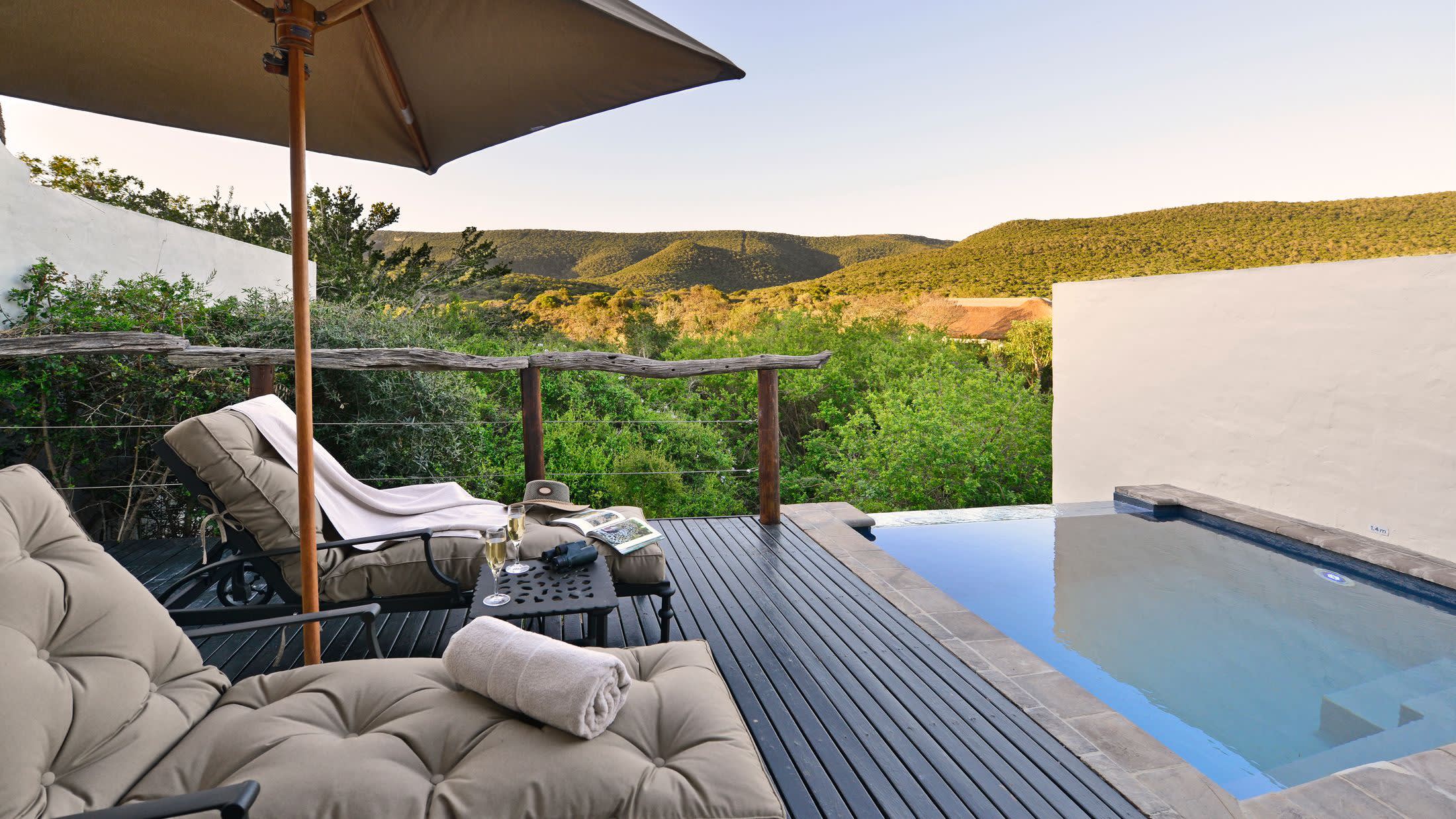 a bedroom with a large umbrella
