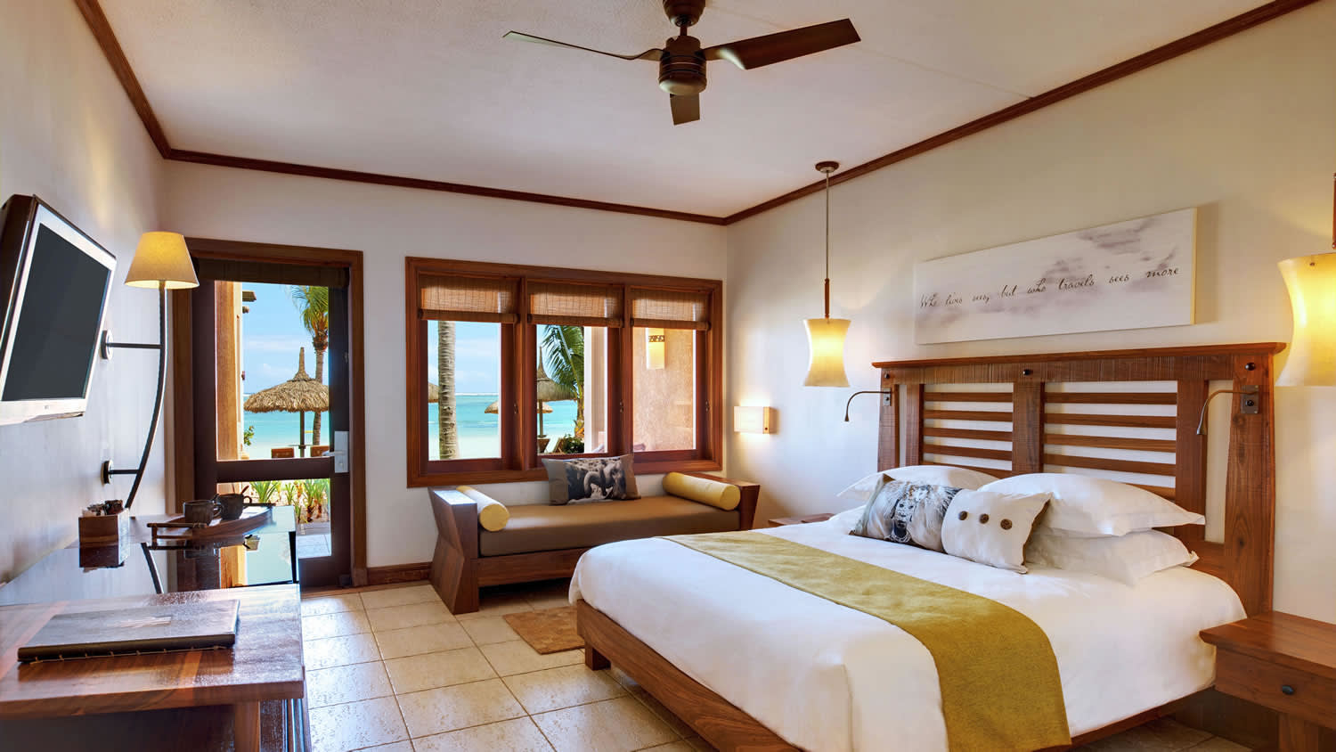 a bedroom with a large bed in a hotel room