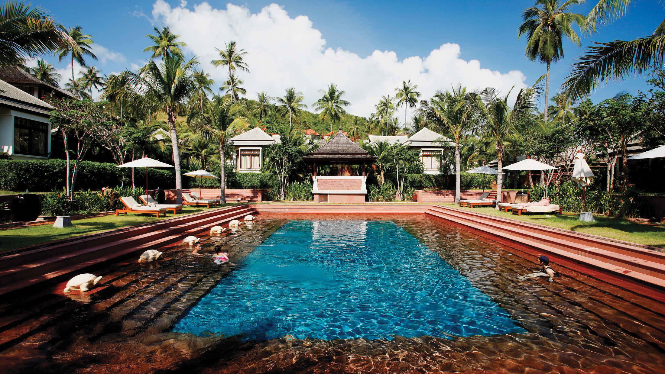 a small house in a pool of water