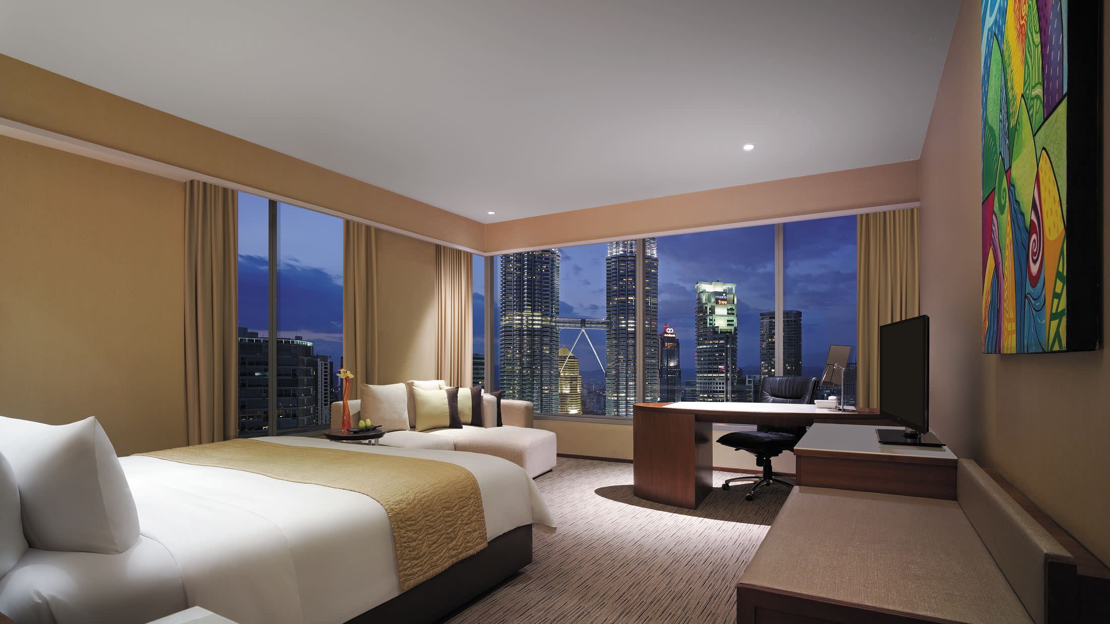 a hotel room with a large window