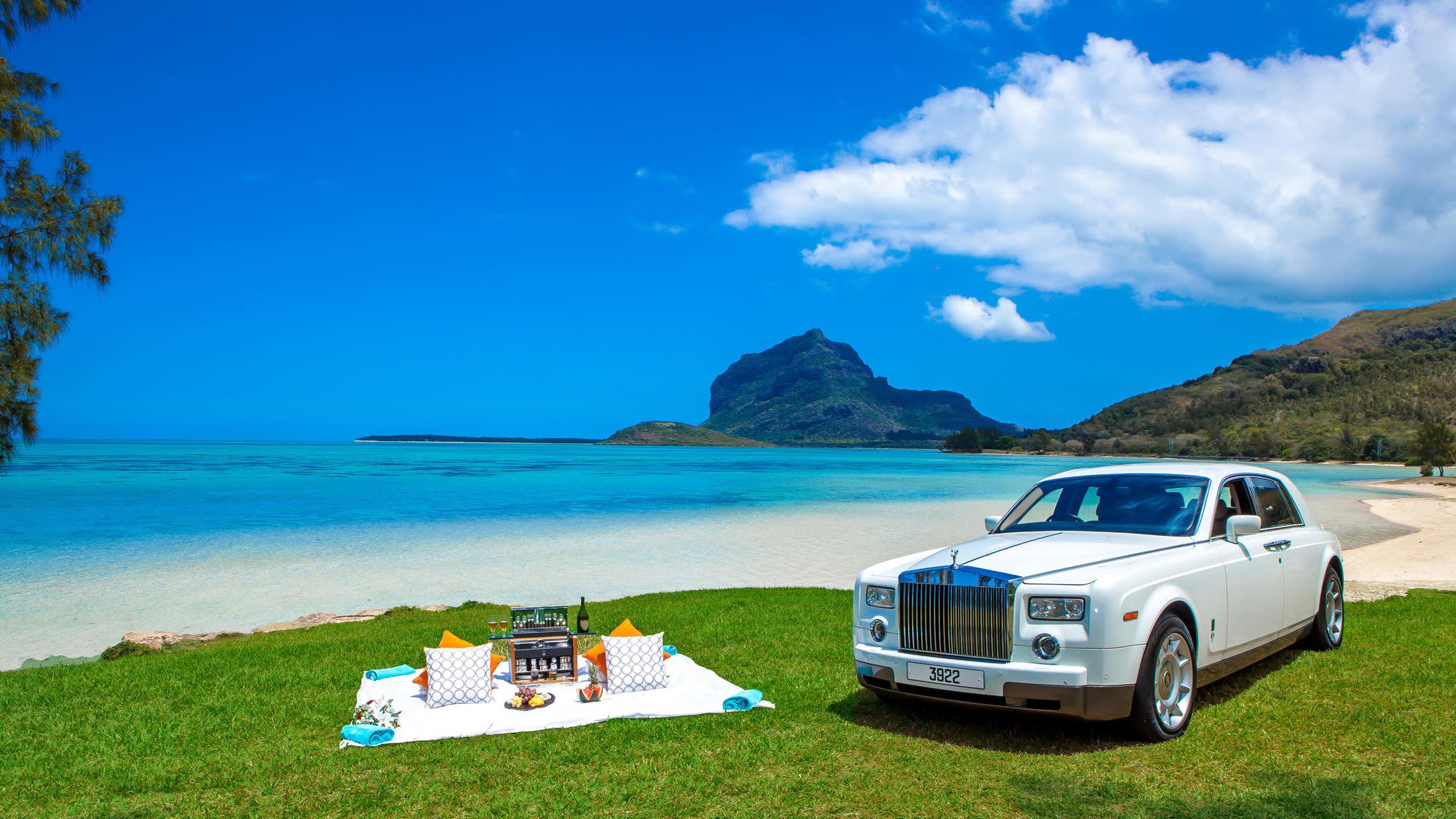 a car parked in a grassy field