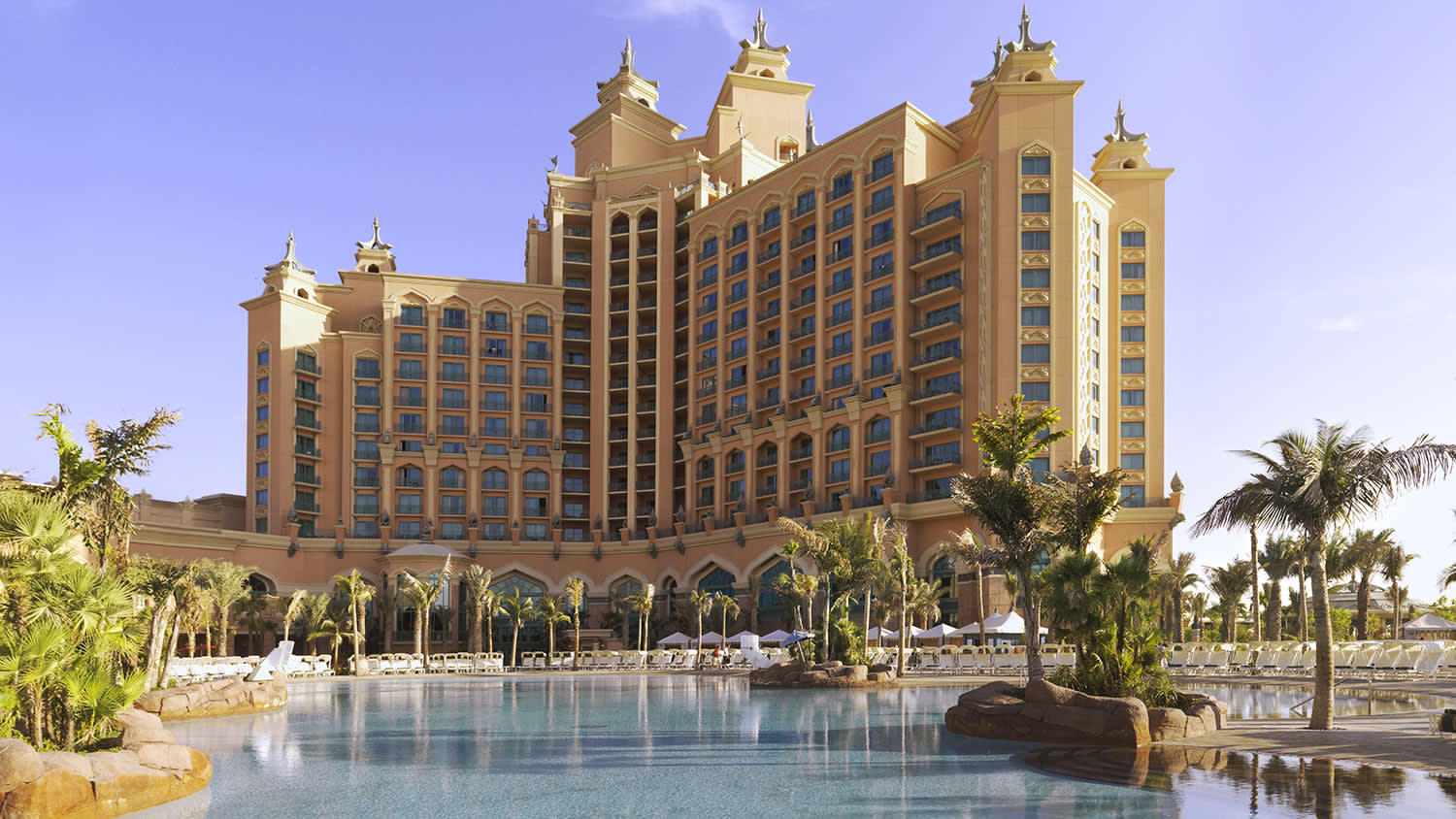 a group of people in front of a tall building