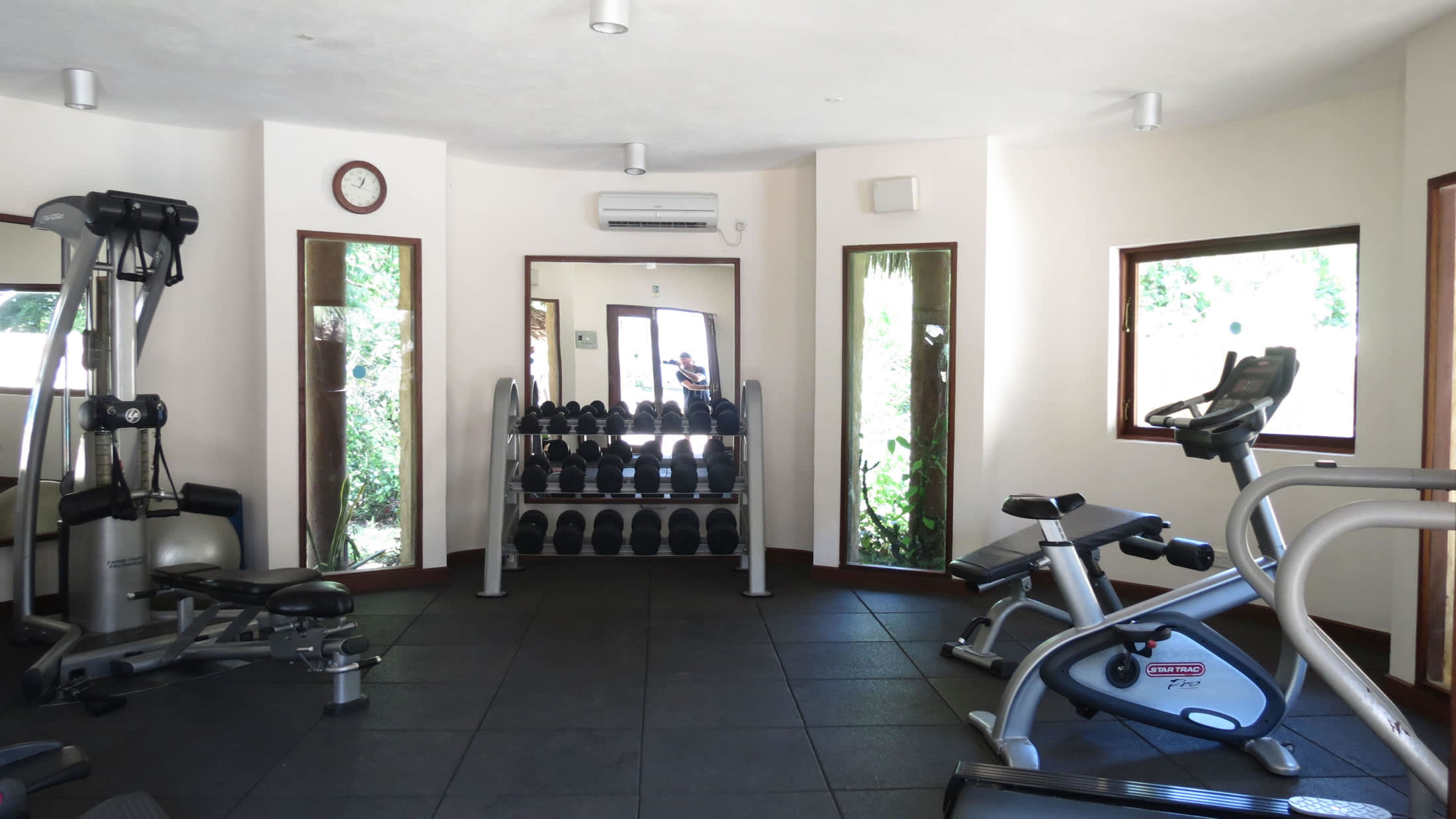 a living room filled with furniture and a fireplace