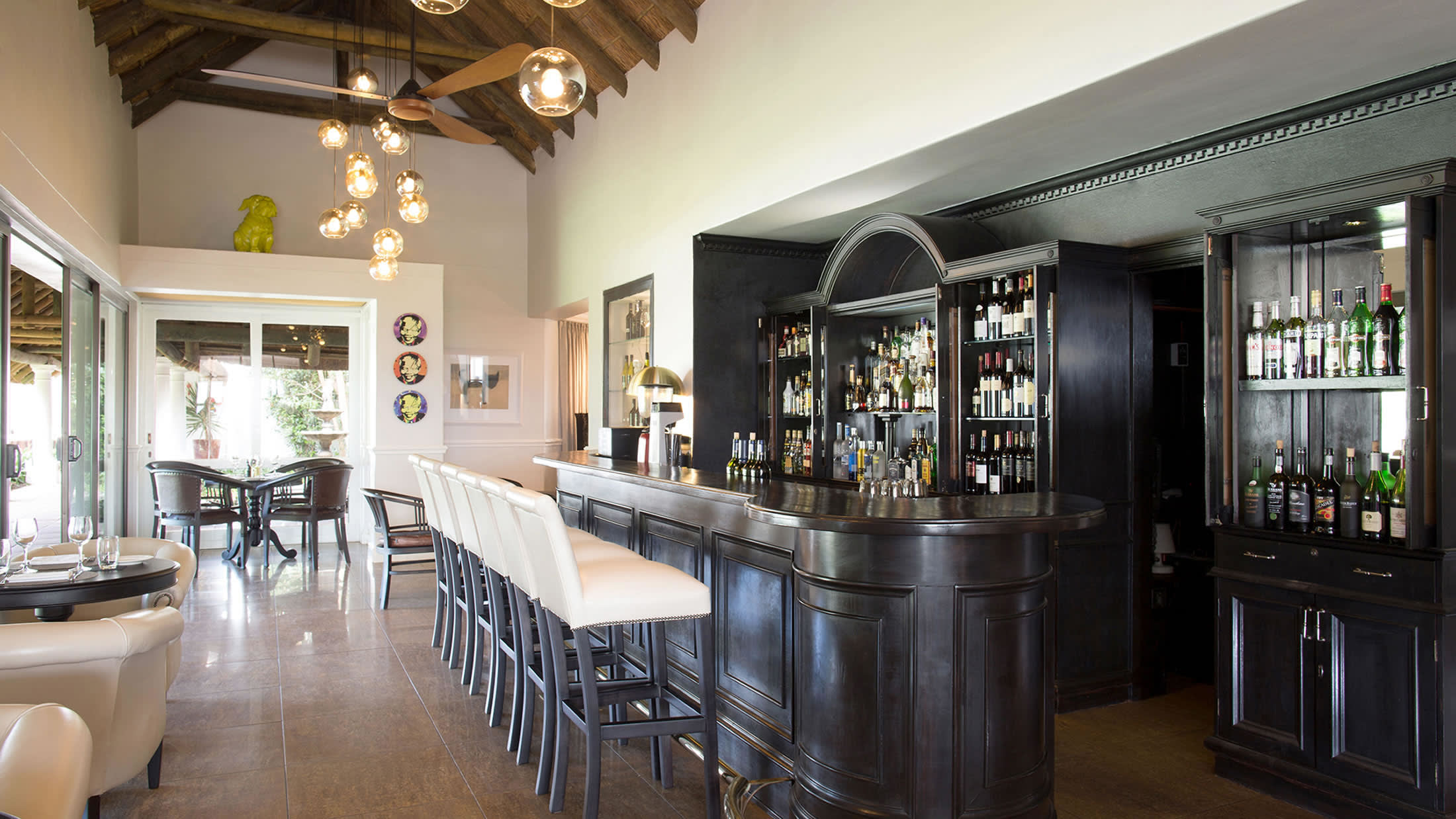 a room filled with furniture and a large window