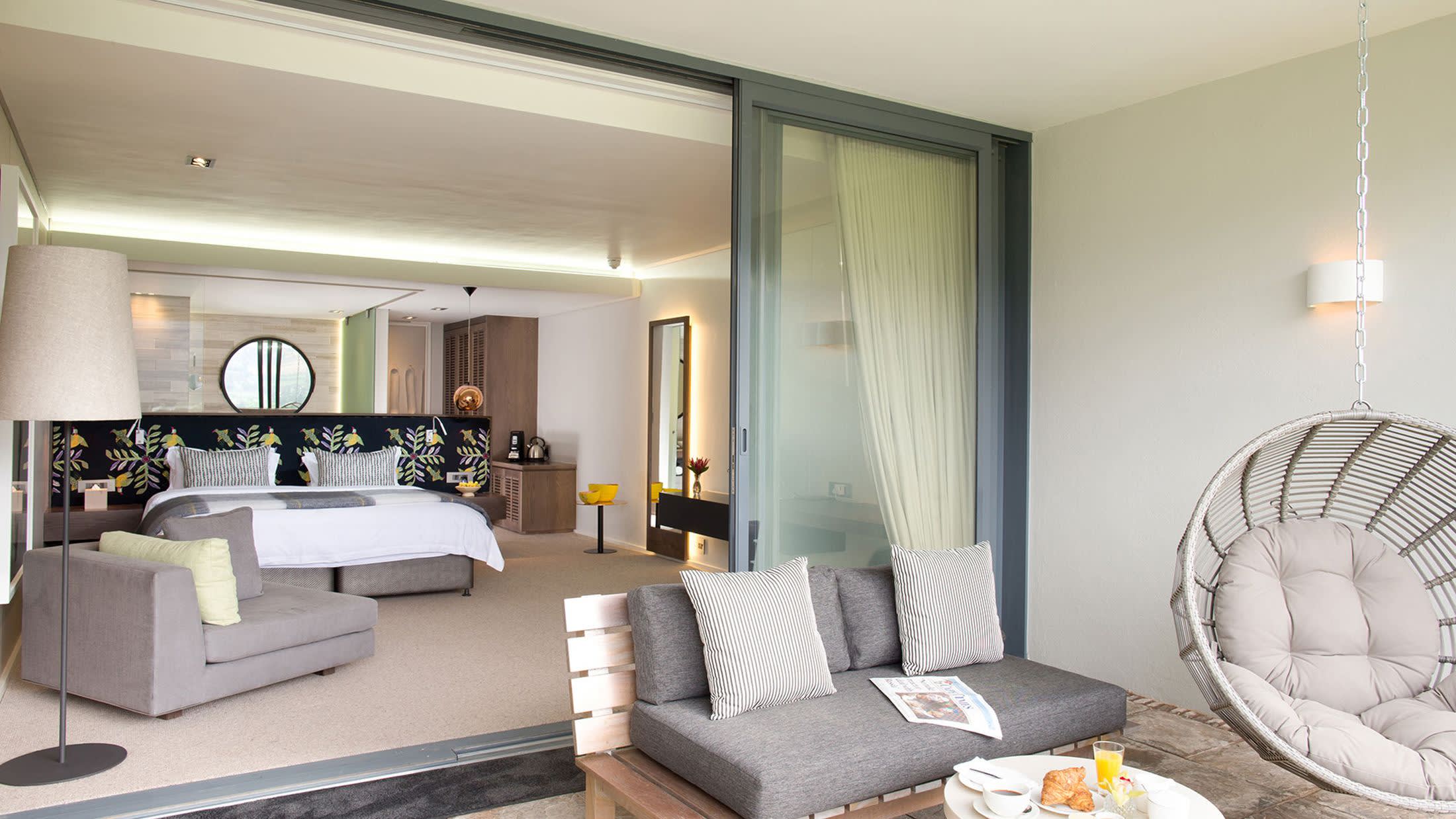 a living room filled with furniture and a table