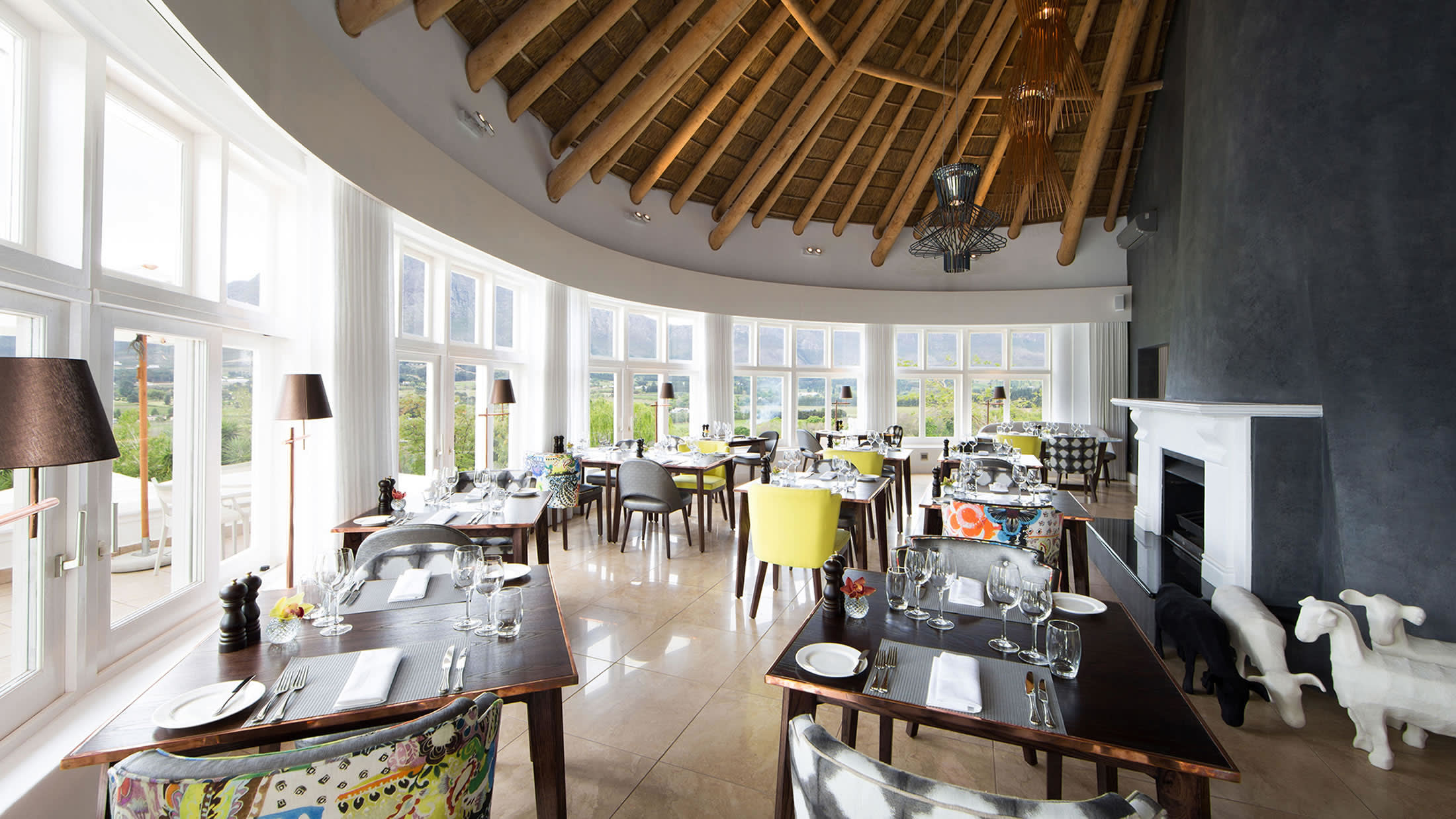 a room filled with furniture and a large window