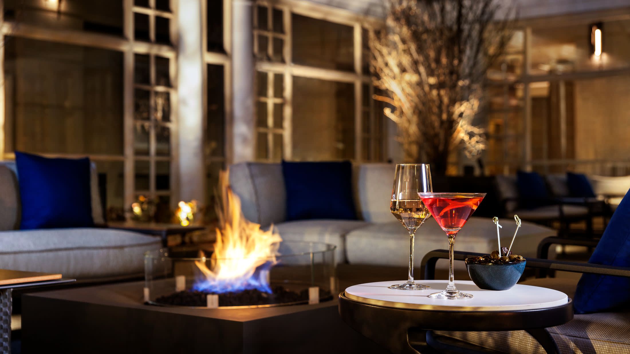 a glass of wine on a table