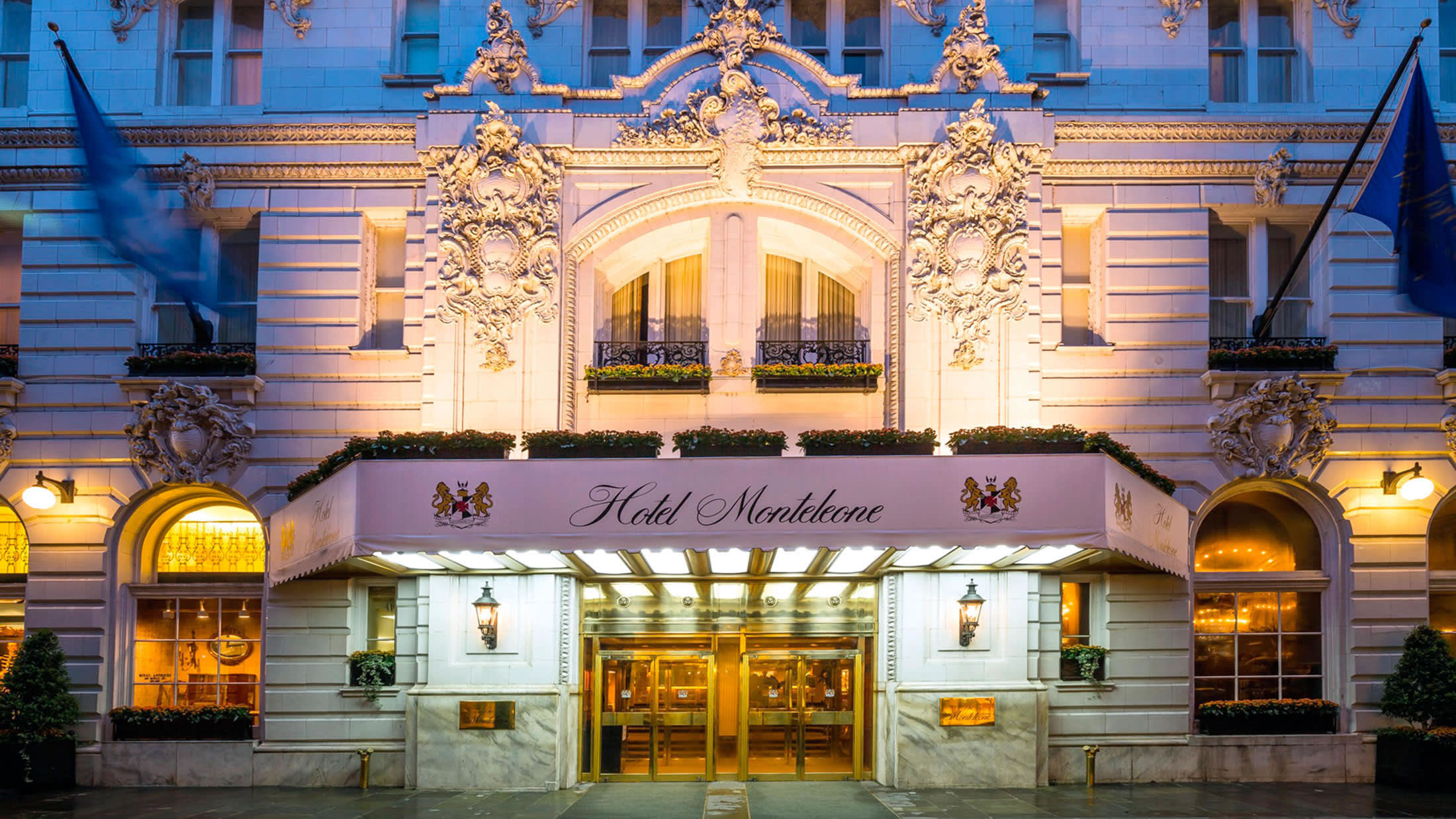 a large brick building with many windows and a fireplace