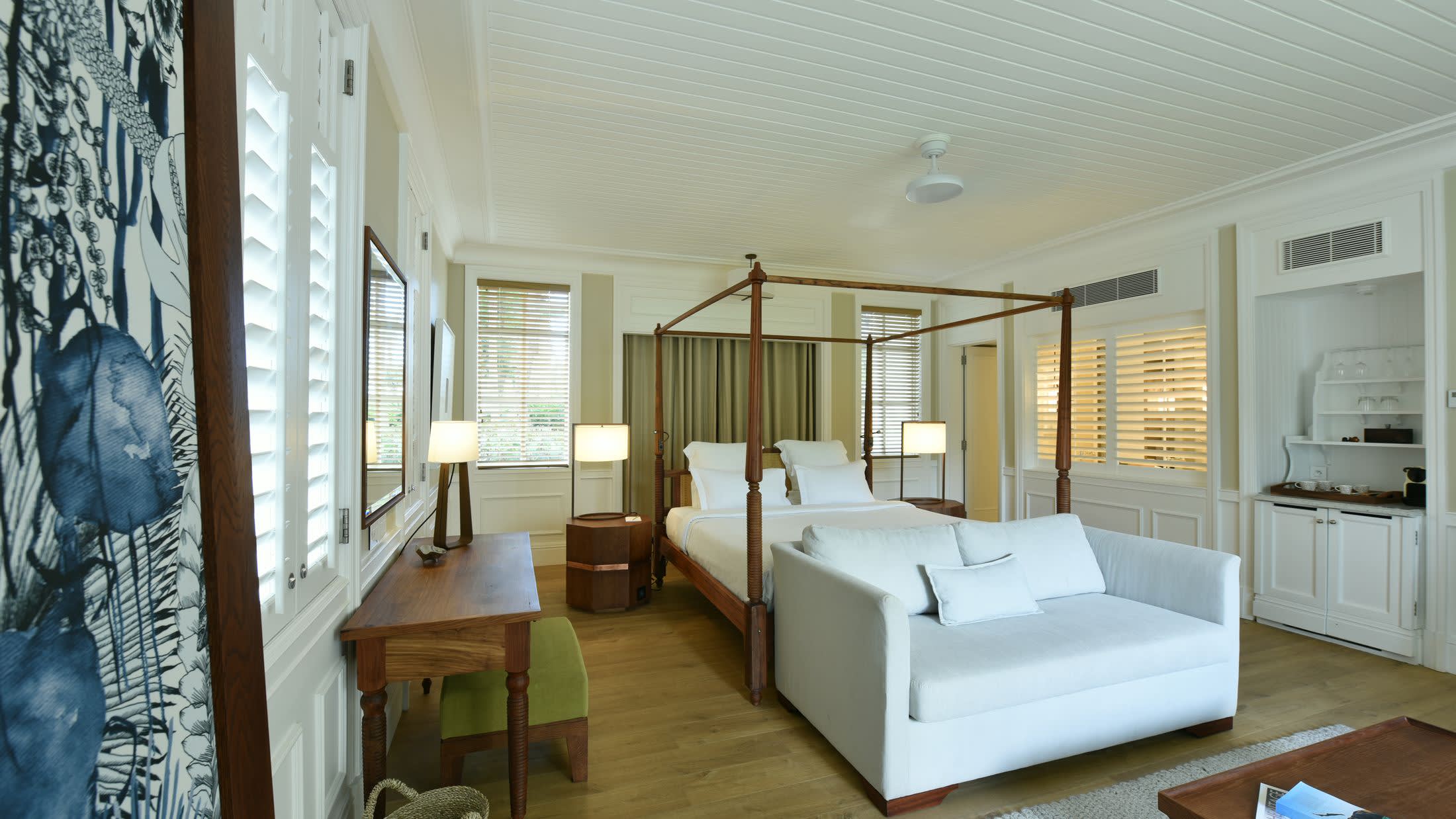 a bedroom with a large bed in a room