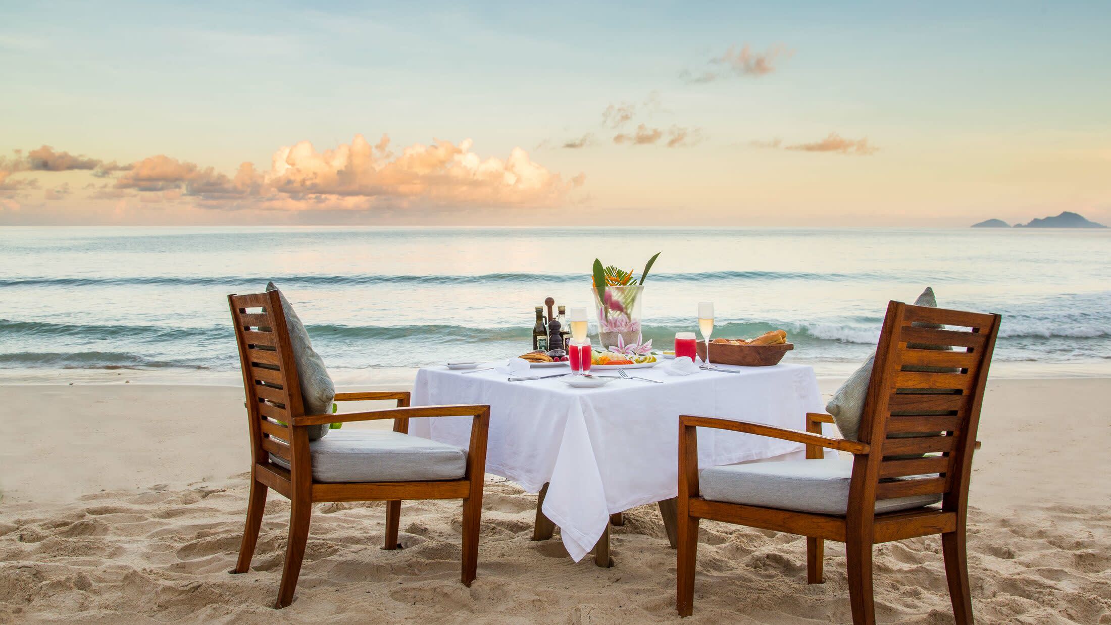a chair sitting in front of a body of water