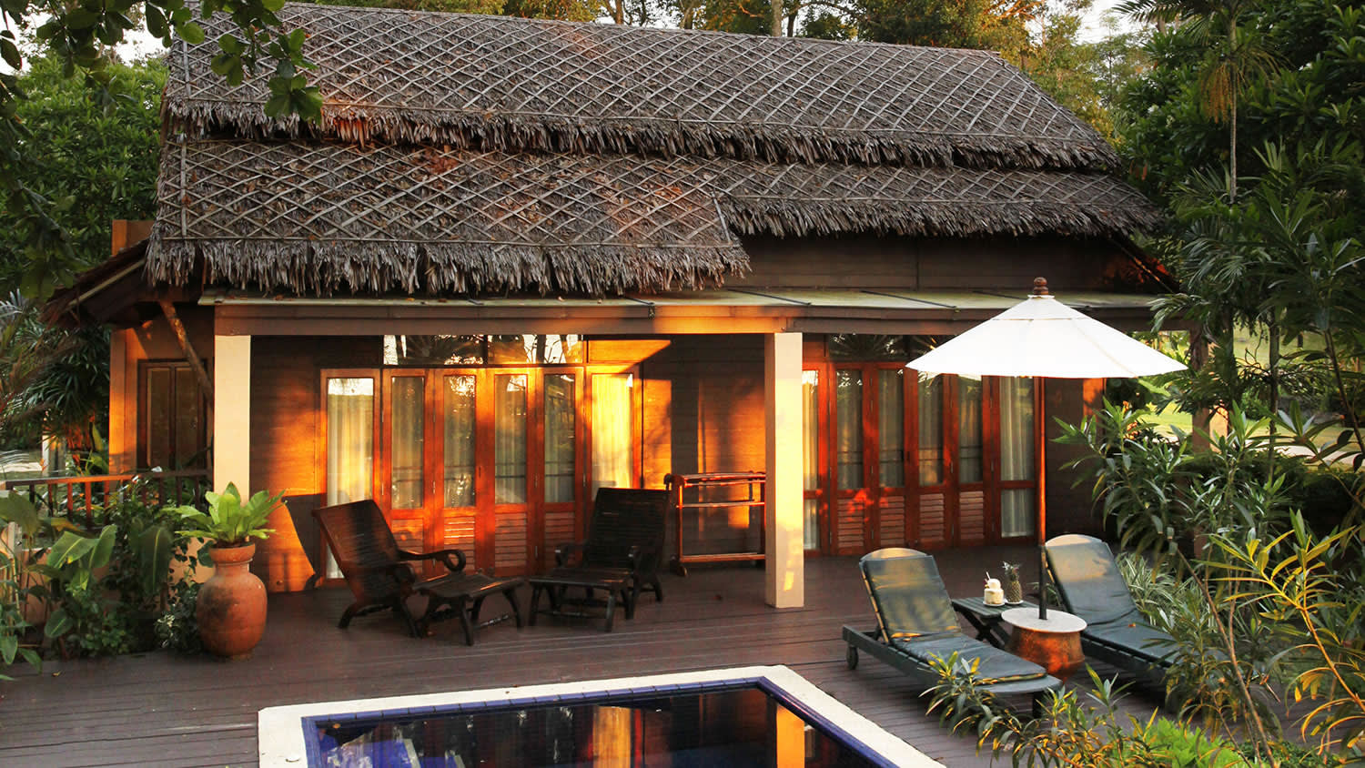 a living area with a building in the background
